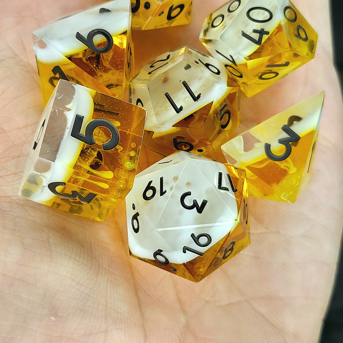 Handmade sharp edge resin dice set inspired by beer white foam effect and black numbers for Dungeons and Dragons tabletop RPGs