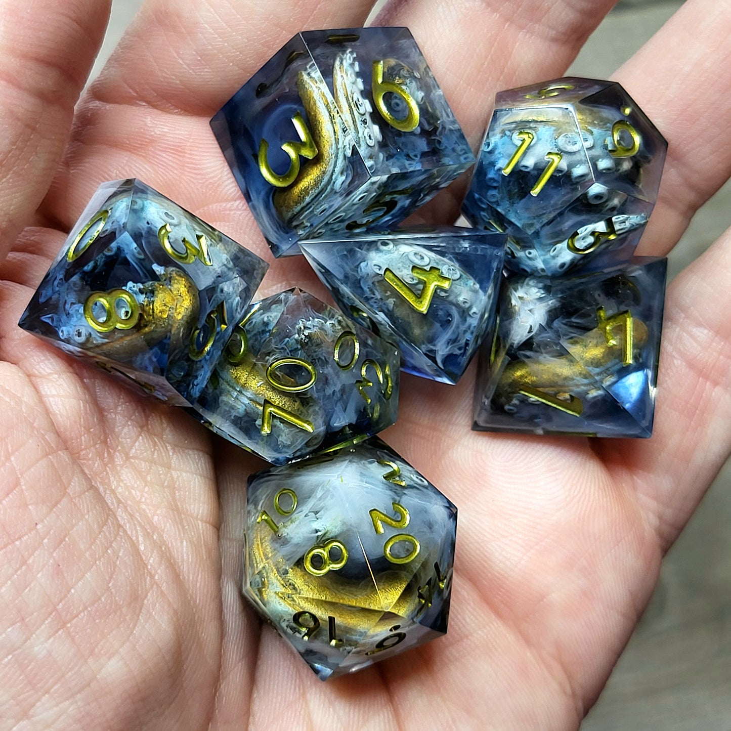 Resin dice set with octopus tentacles inside, gold numbers, perfect for Dungeons and Dragons, Call of Cthulhu, and tabletop RPG games