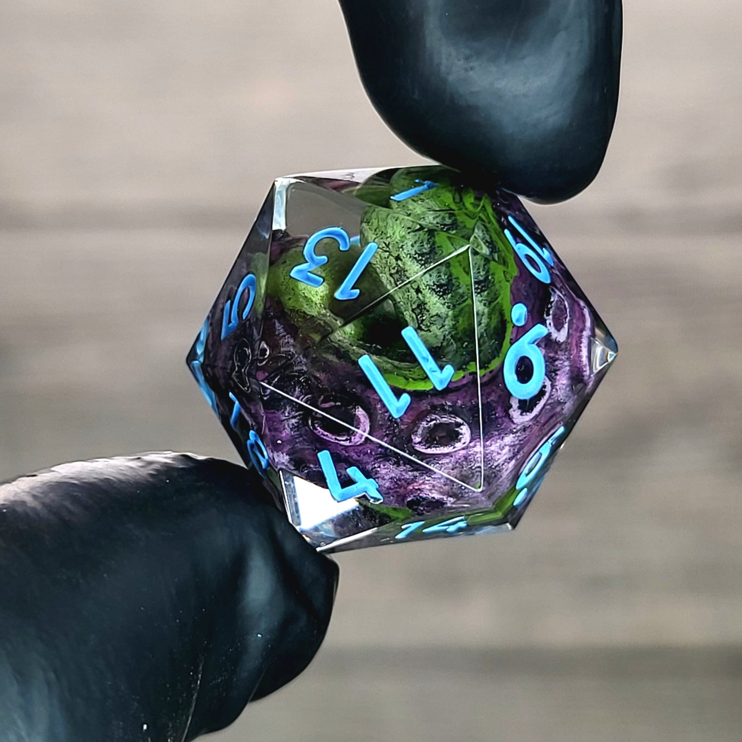 D20 dice with green tentacles inside and blue numbers for play dnd , dungeons and dragons , Call of Cthulhu