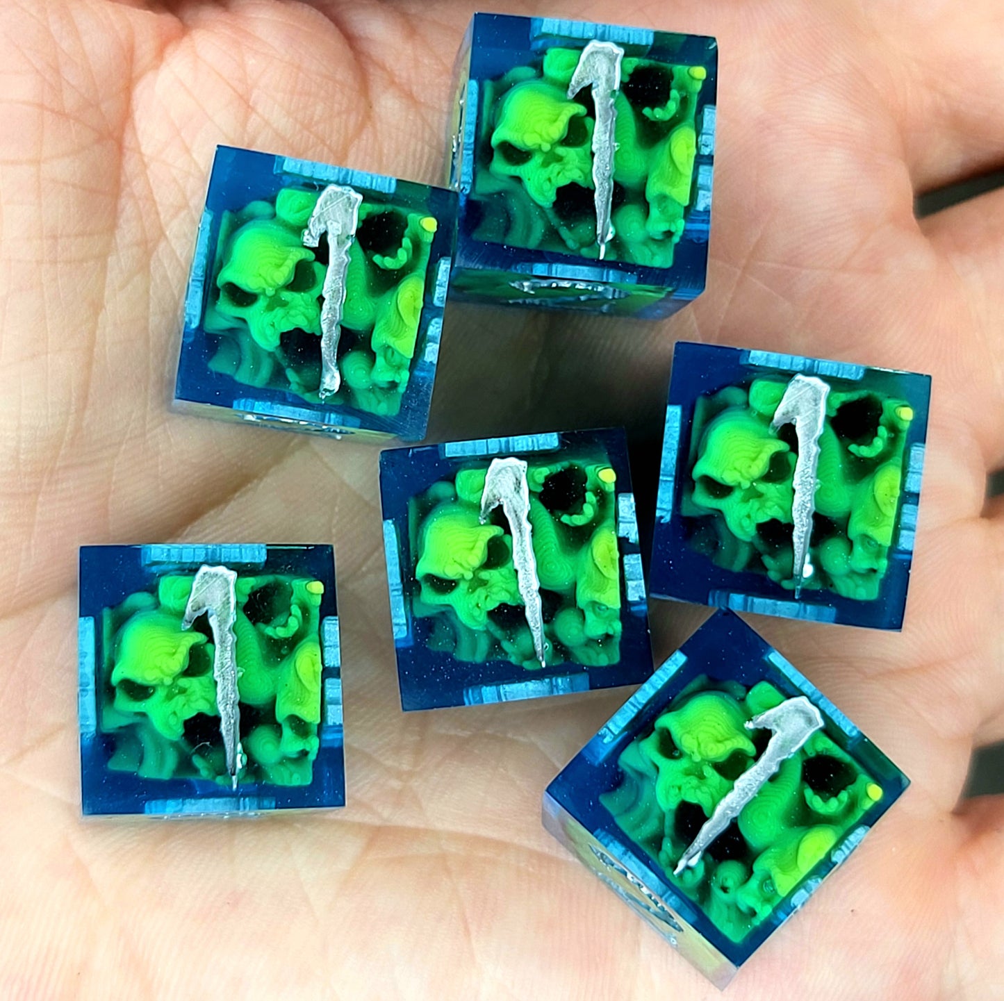 D6 dice set with mini skulls inside, blue resin details, gothic style for Dungeons and Dragons and tabletop role-playing games