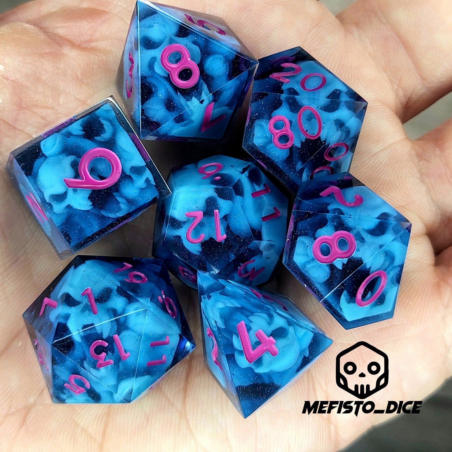 Dice set with blue spirit inside and magenta numbers for play dnd , dungeons and dragons