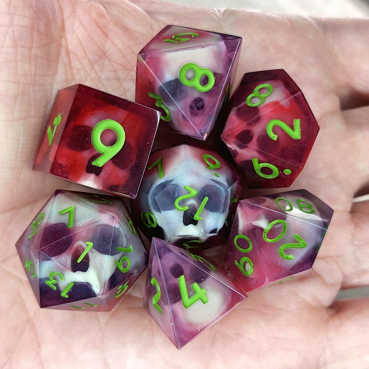 Dnd Dice set for role playing for Dungeons and Dragons with skull inside and red resin with green numbers