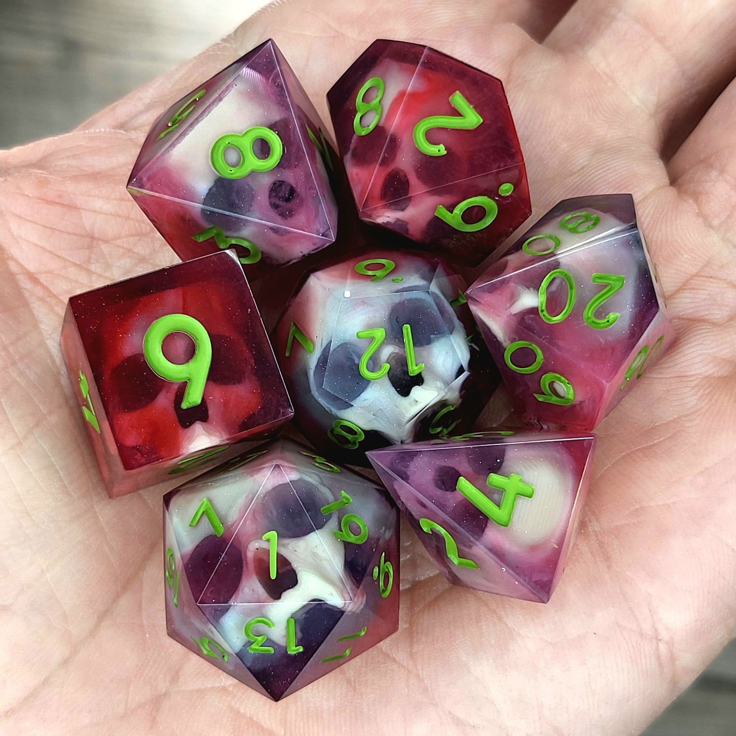 Dnd Dice set for role playing for Dungeons and Dragons with skull inside and red resin with green numbers