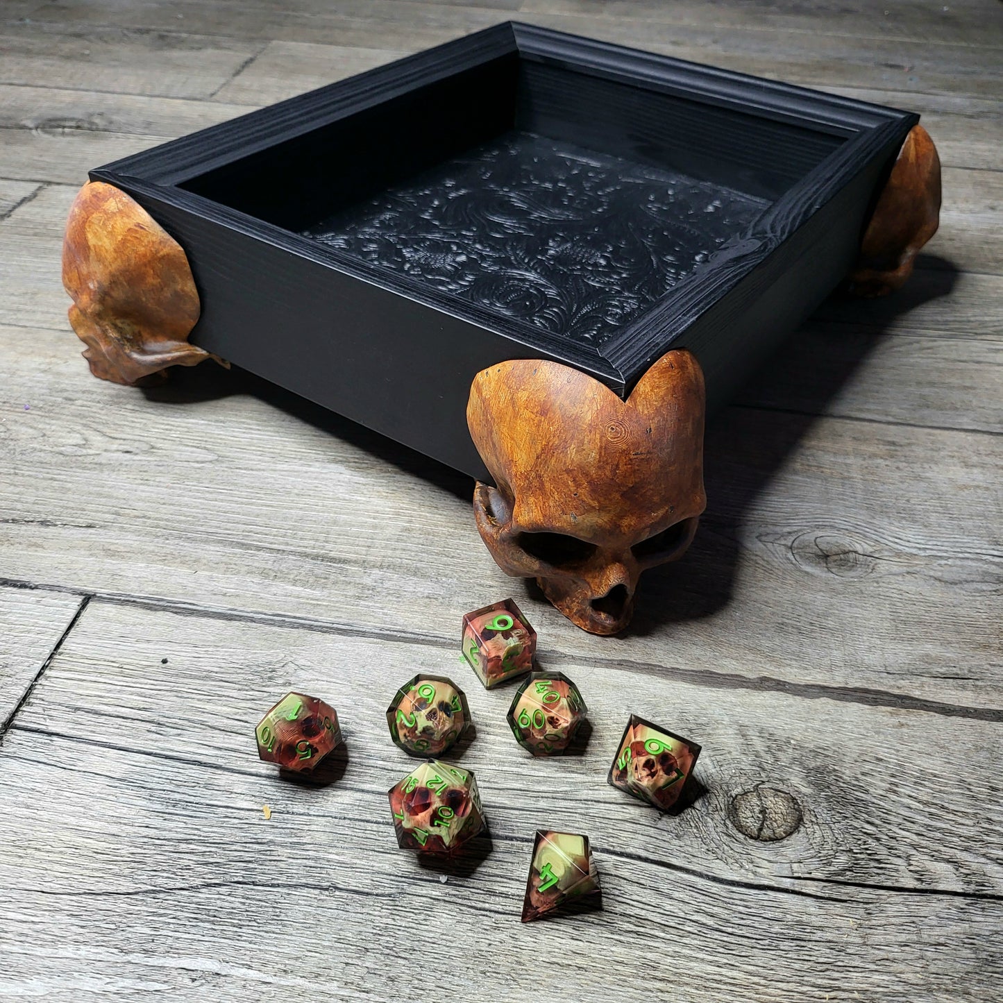 Dice tray with skull feet for dice rolling for tabletop role playing board games