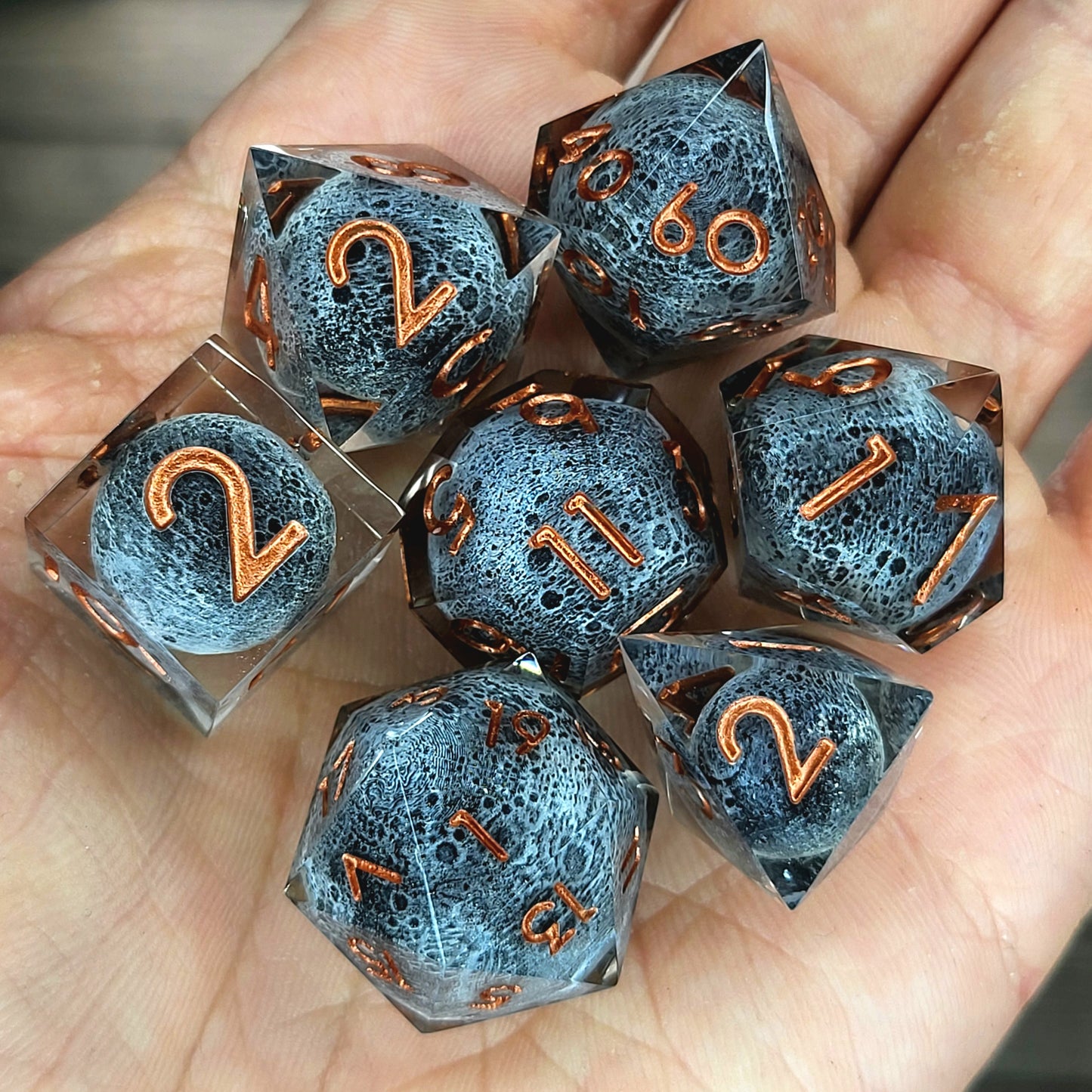 Dice set with moon inside and bronze numbers for play dnd , dungeons and dragons