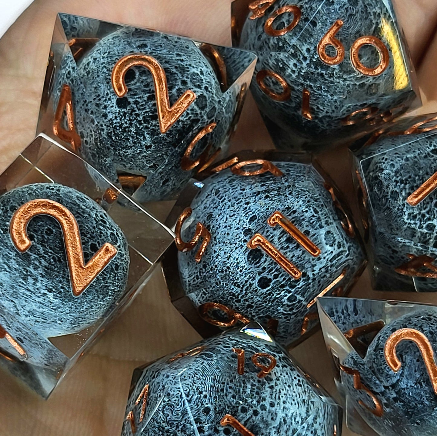 Dice set with moon inside and bronze numbers for play dnd , dungeons and dragons
