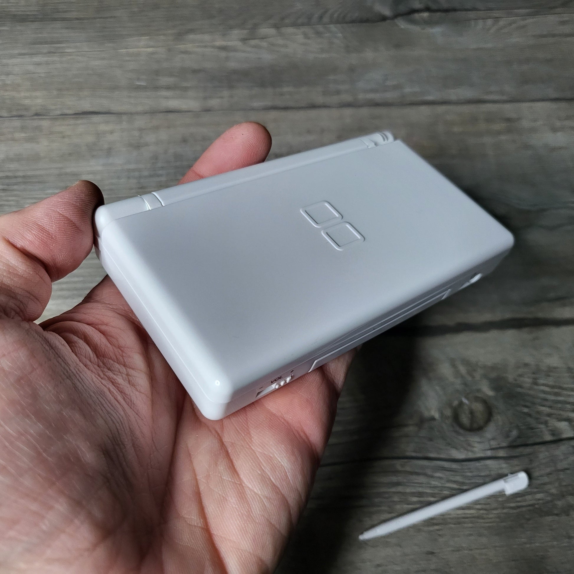Custom Nintendo DS Lite console with colored snes buttons