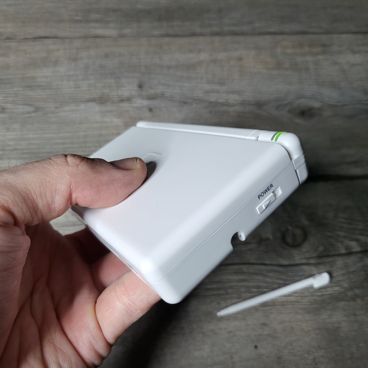 Custom Nintendo DS Lite console with colored snes buttons