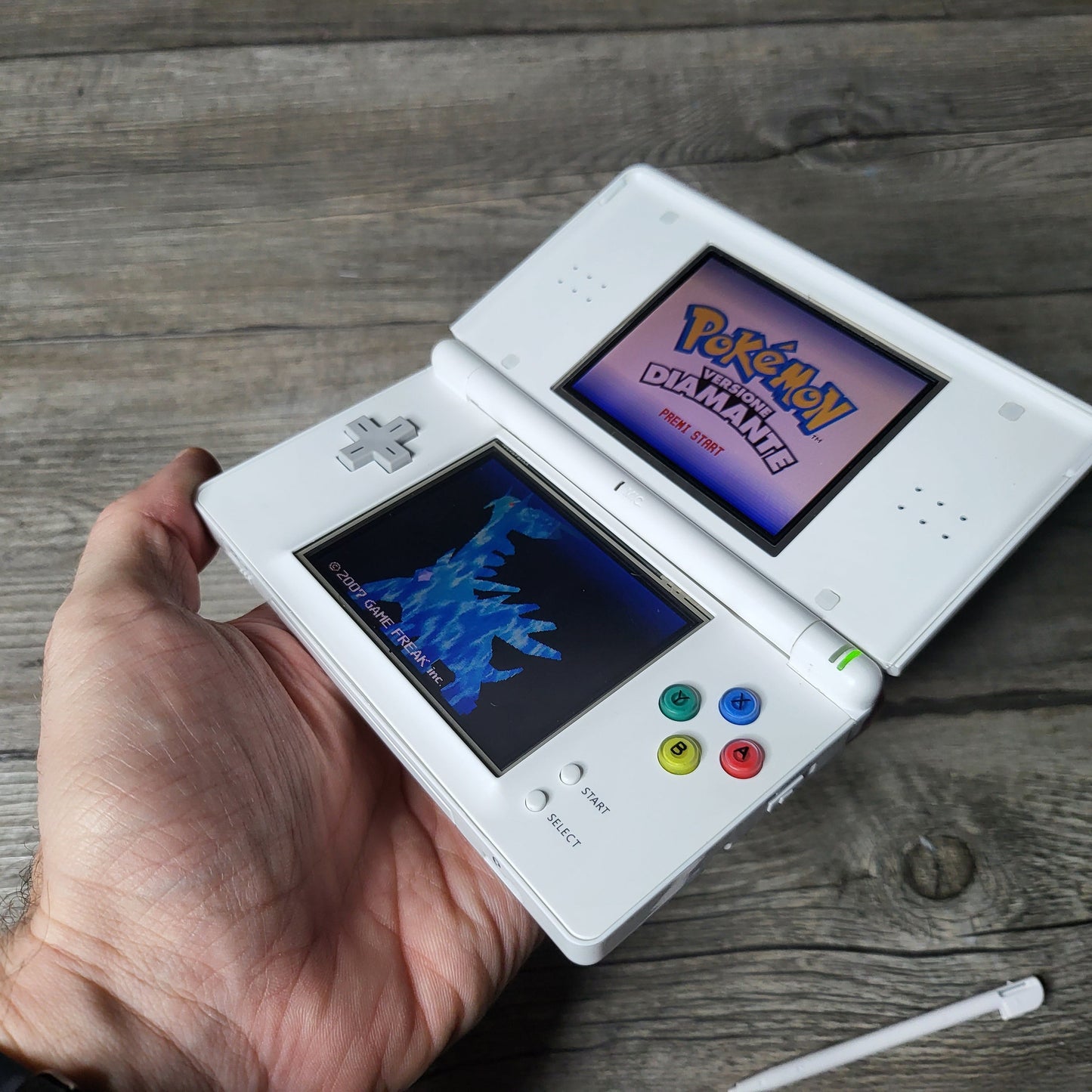 Custom Nintendo DS Lite console with colored snes buttons