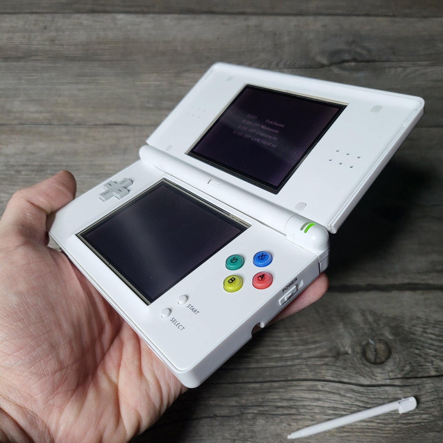 Custom Nintendo DS Lite console with colored snes buttons