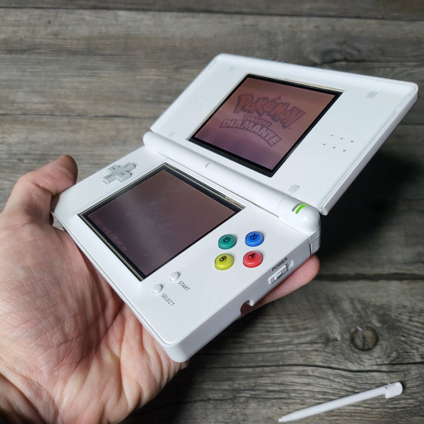 Custom Nintendo DS Lite console with colored snes buttons