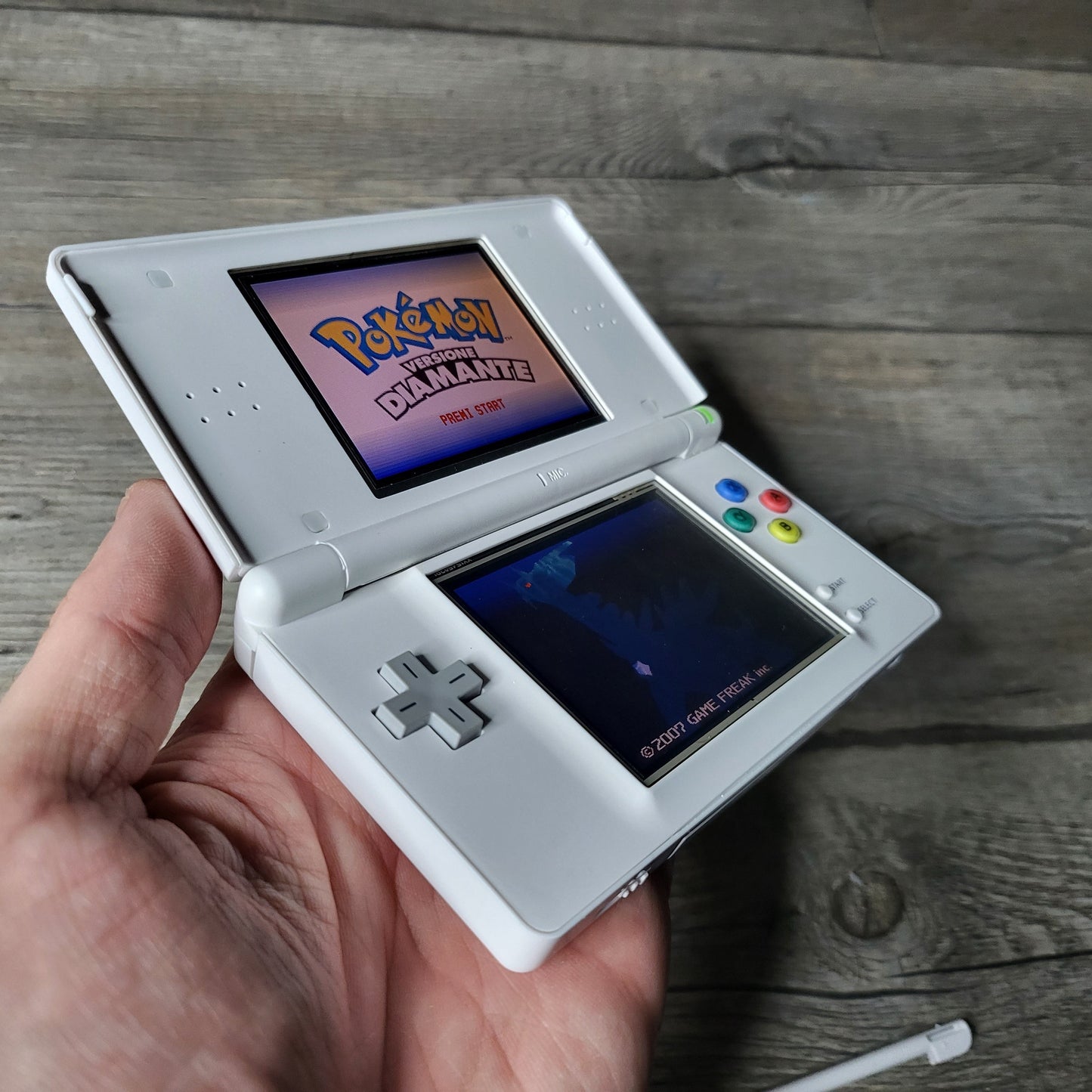 Custom Nintendo DS Lite console with colored snes buttons