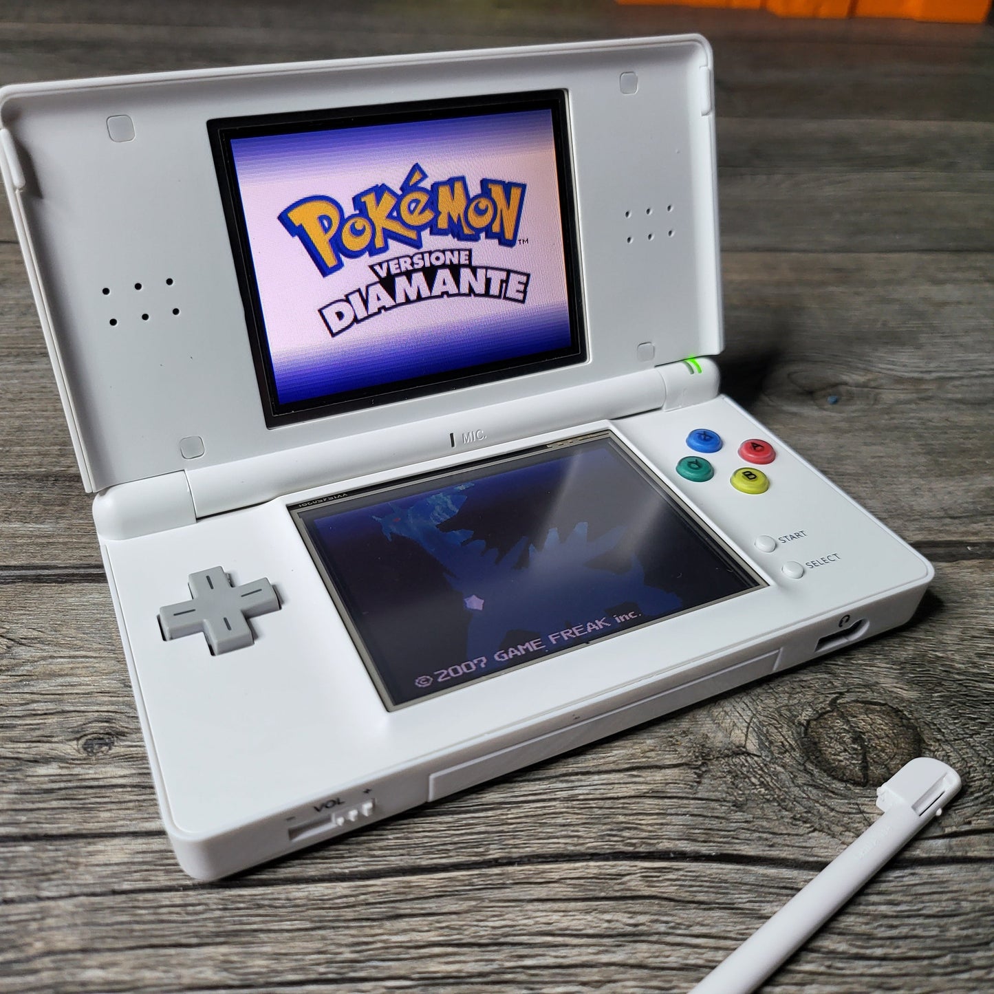 Custom Nintendo DS Lite console with colored snes buttons