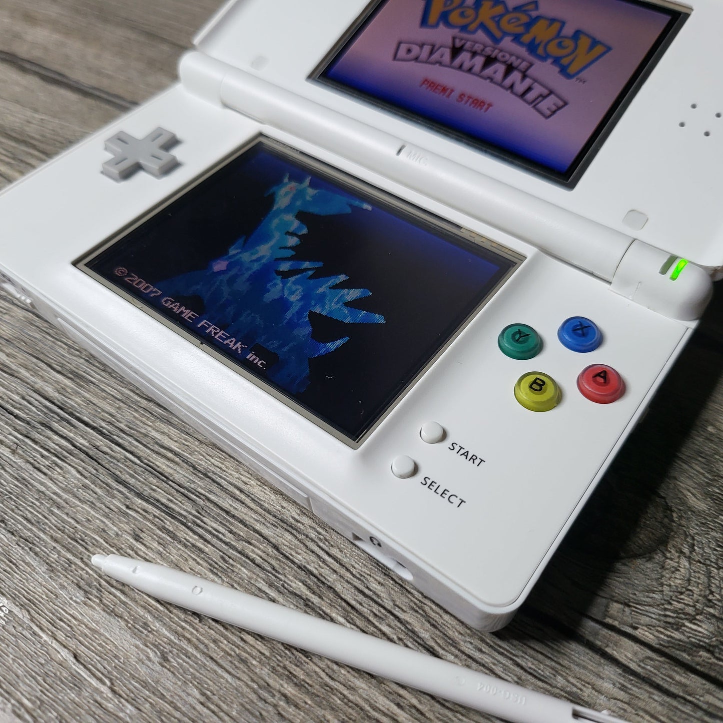 Custom Nintendo DS Lite console with colored snes buttons