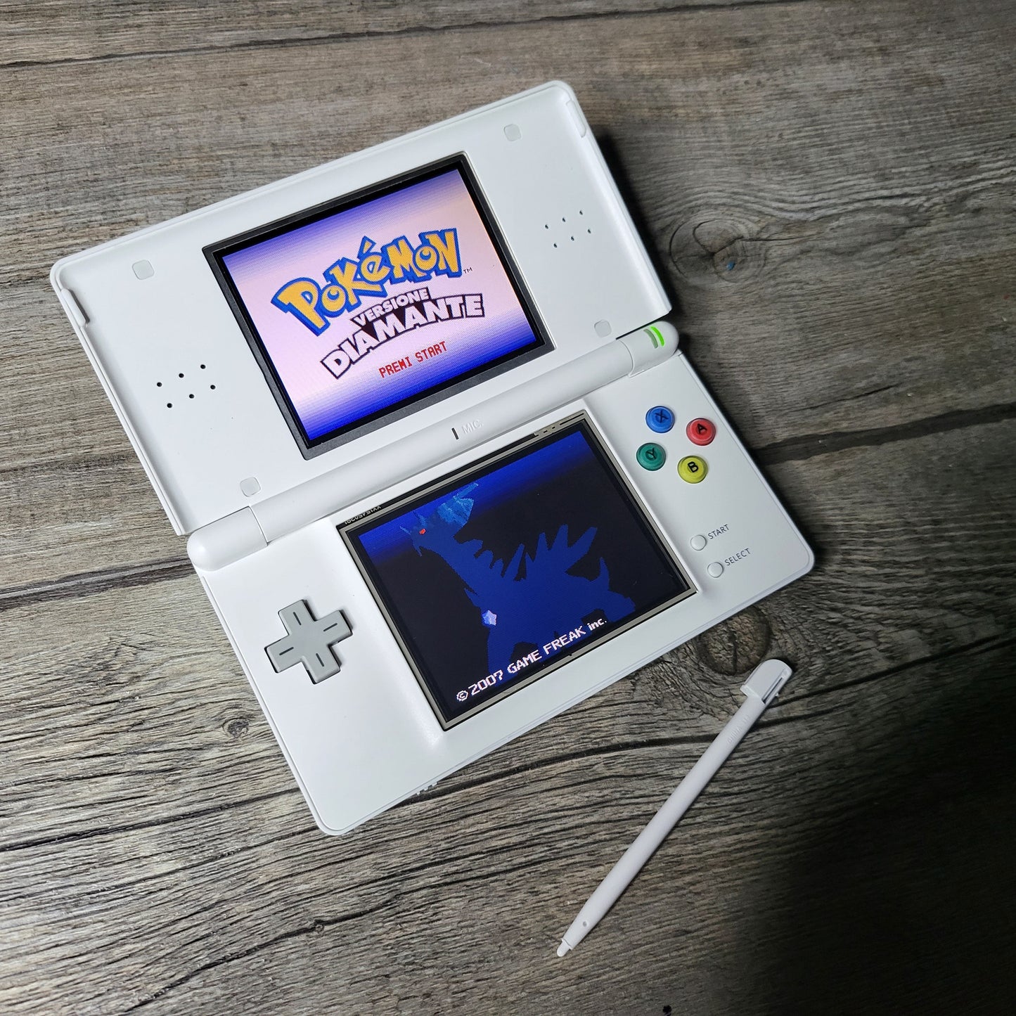 Custom Nintendo DS Lite console with colored snes buttons