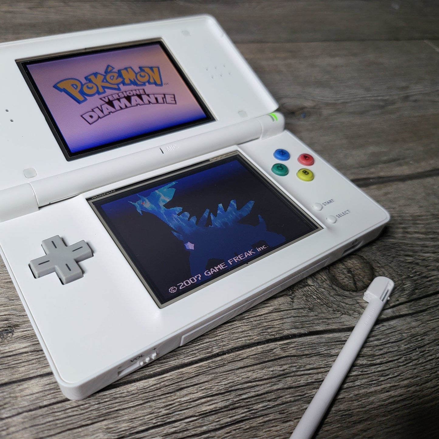 Custom Nintendo DS Lite console with colored snes buttons