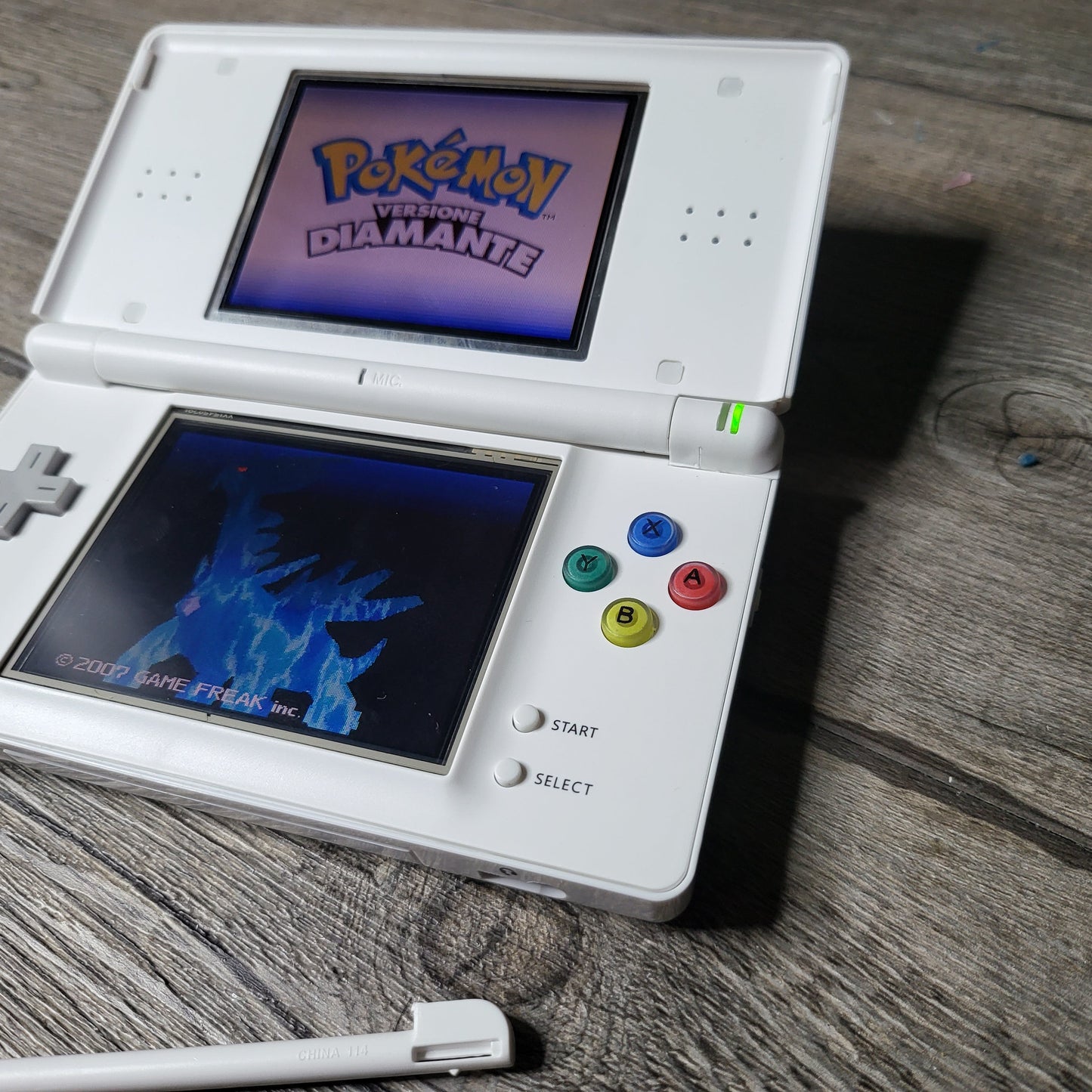 Custom Nintendo DS Lite console with colored snes buttons