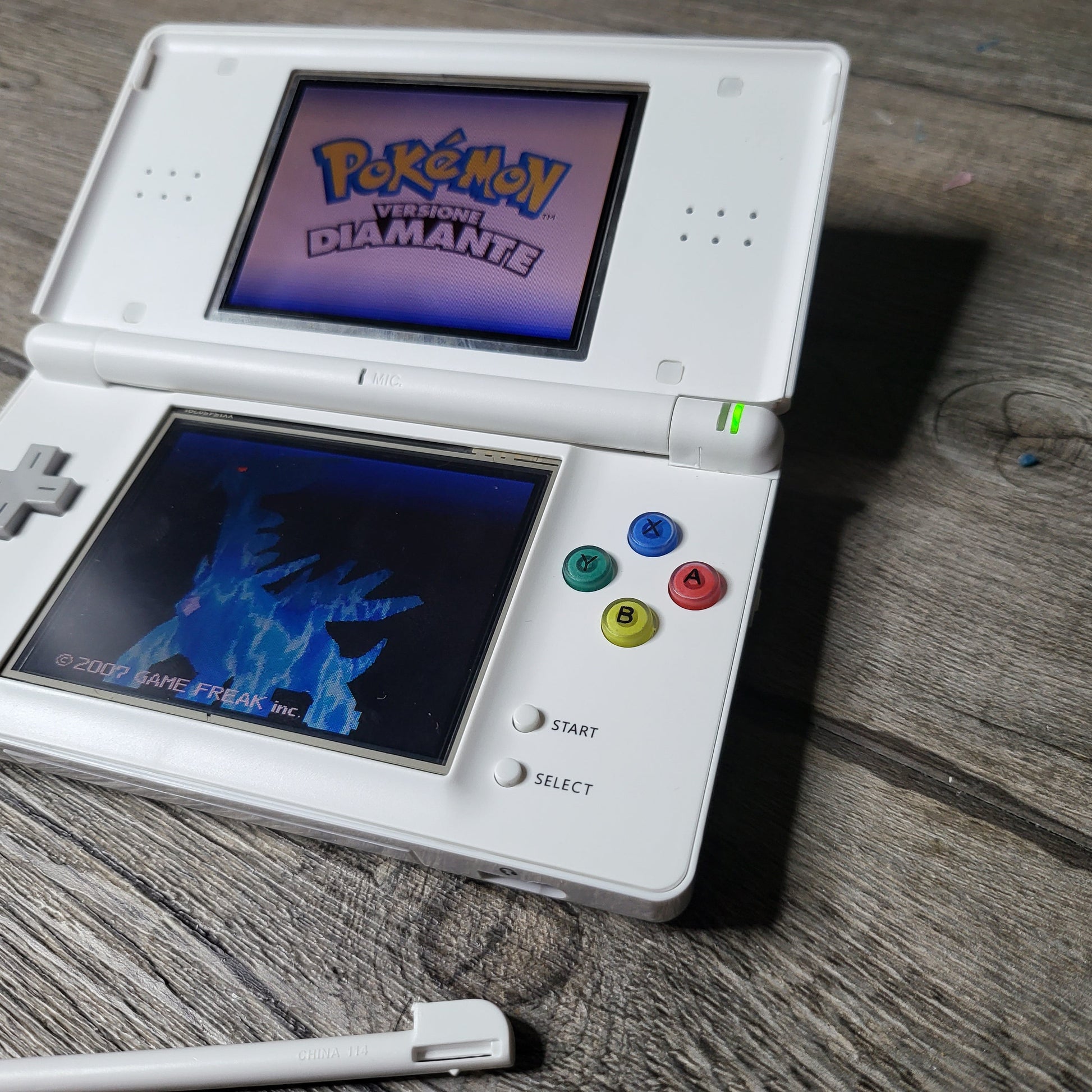 Custom Nintendo DS Lite console with colored snes buttons