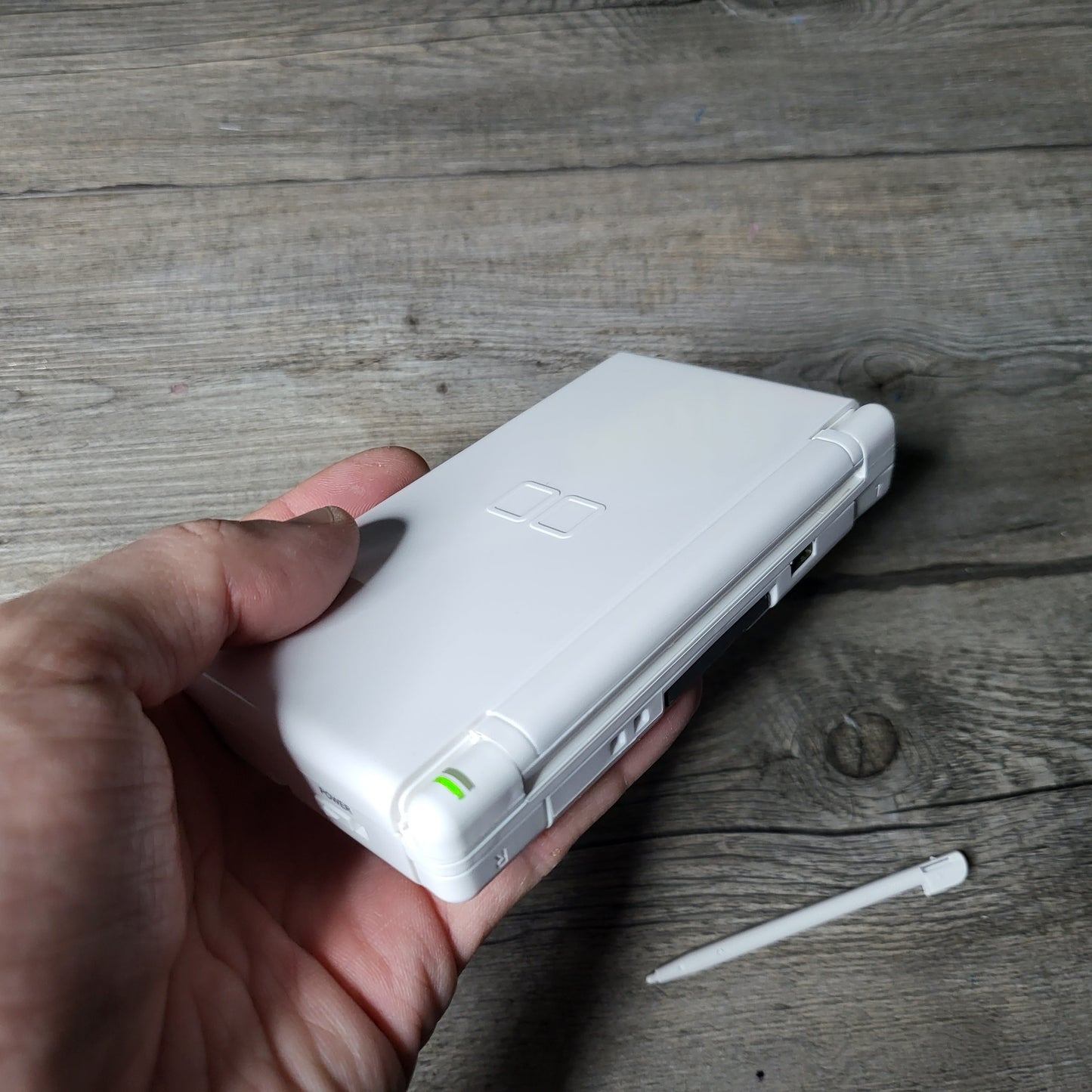 Custom Nintendo DS Lite console with colored snes buttons