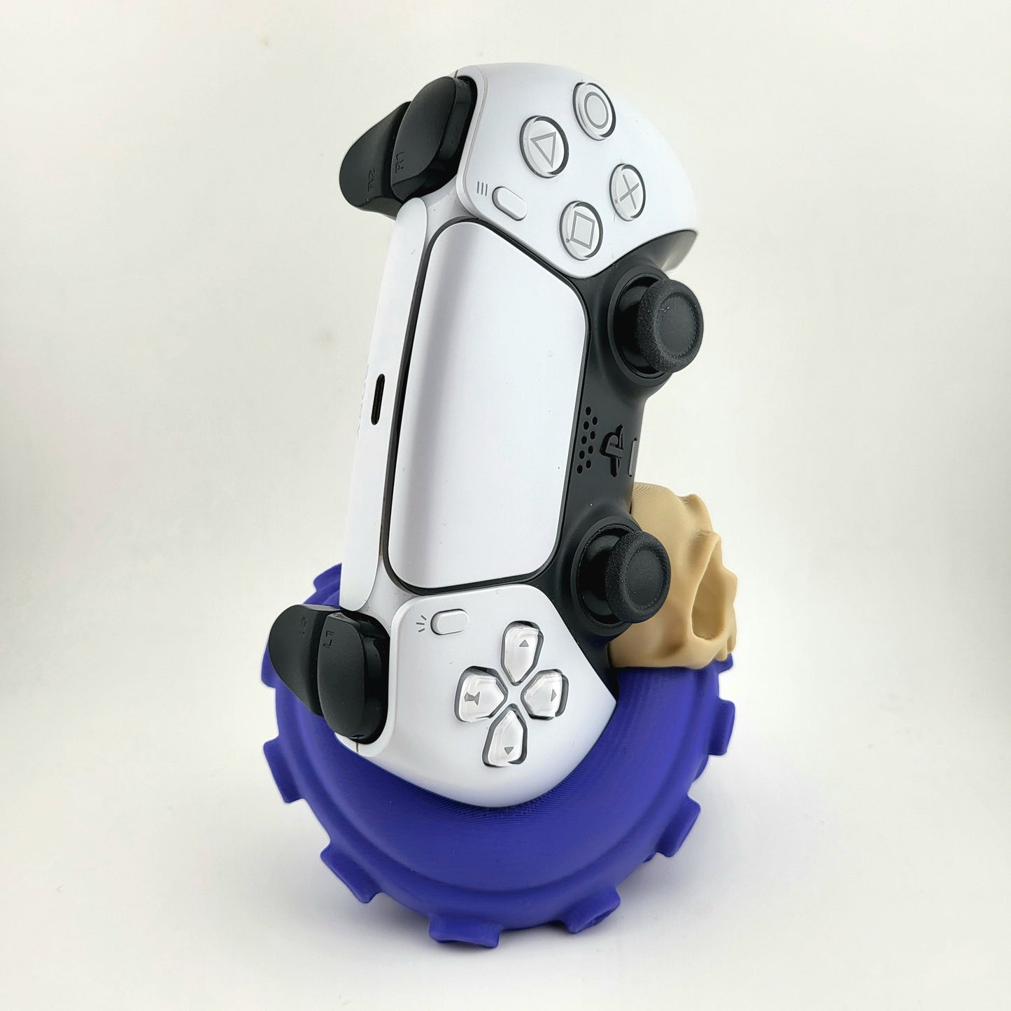 One PS5 controller stand featuring a skull design and purple tentacles, 3D printed with high-quality PLA.