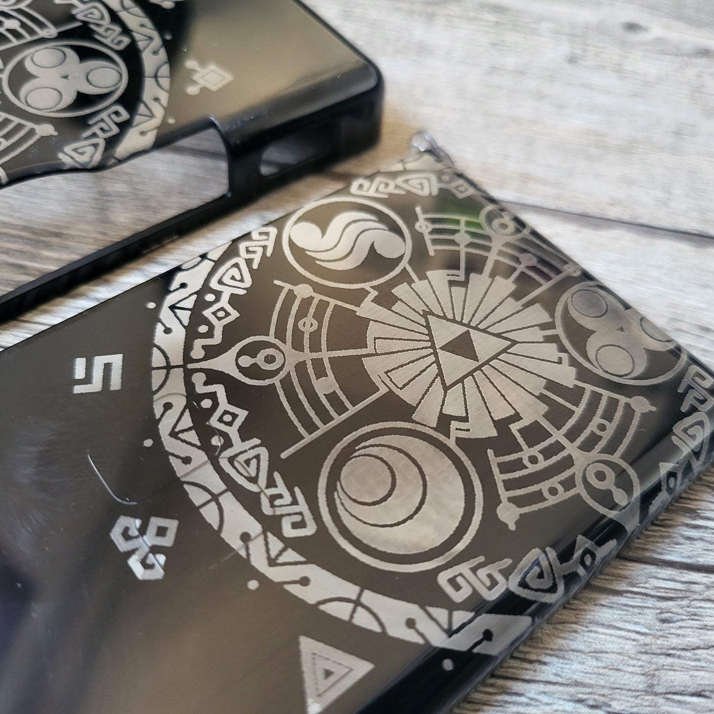 Custom shell cover for Nintendo with Zelda themed laser engravings