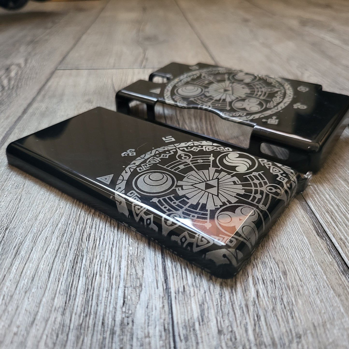 Custom shell cover for Nintendo with Zelda themed laser engravings