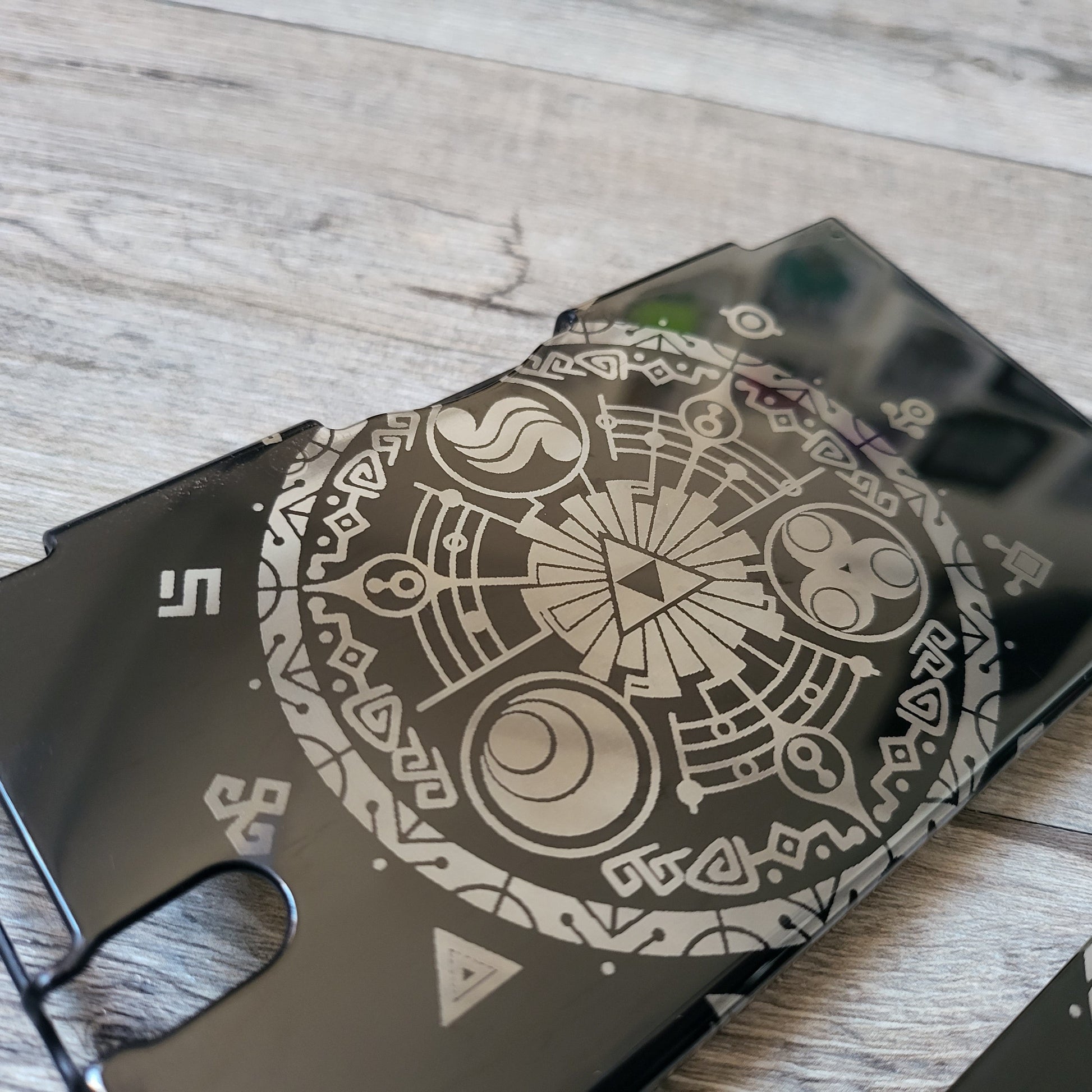 Custom shell cover for Nintendo with Zelda themed laser engravings