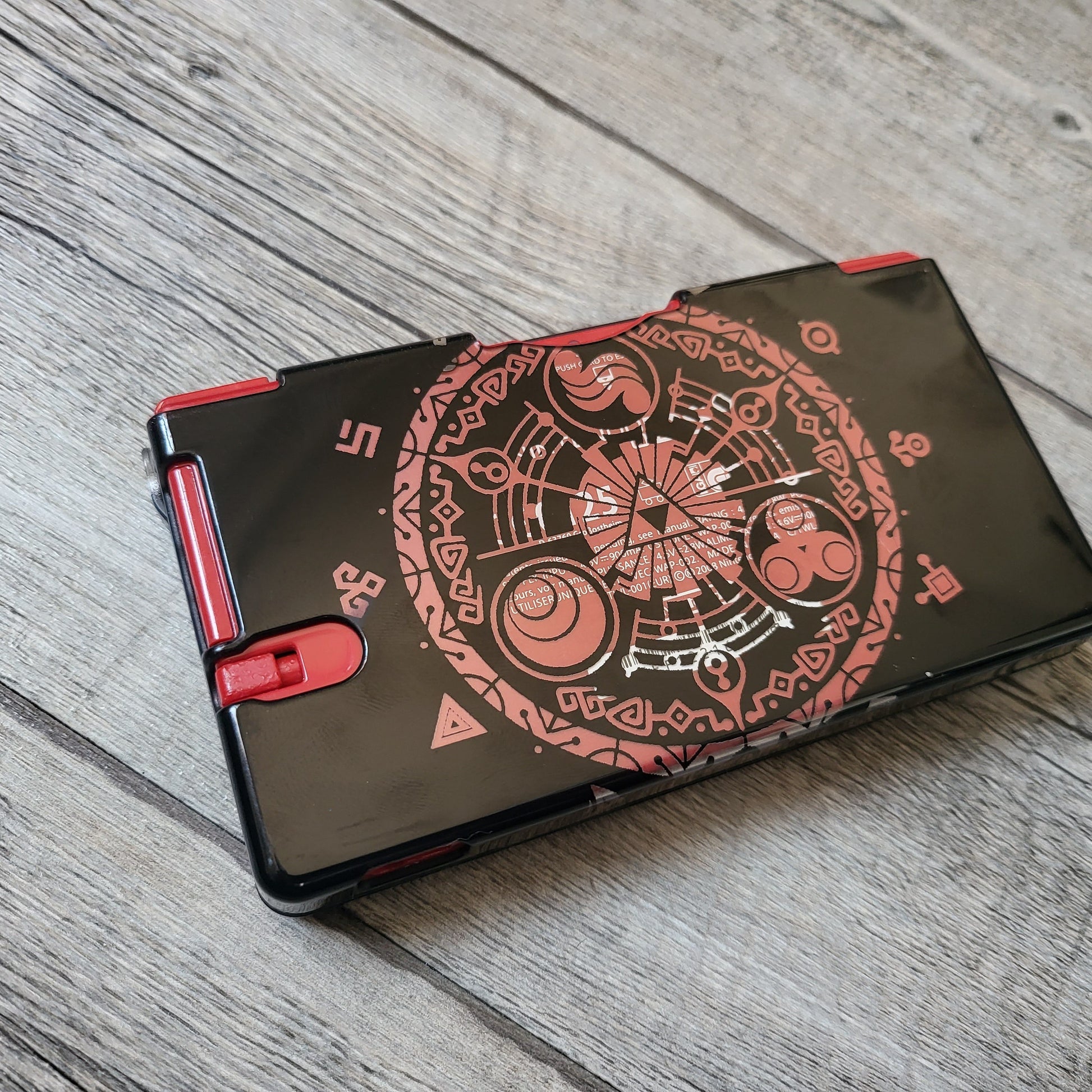 Custom shell cover for Nintendo with Zelda themed laser engravings