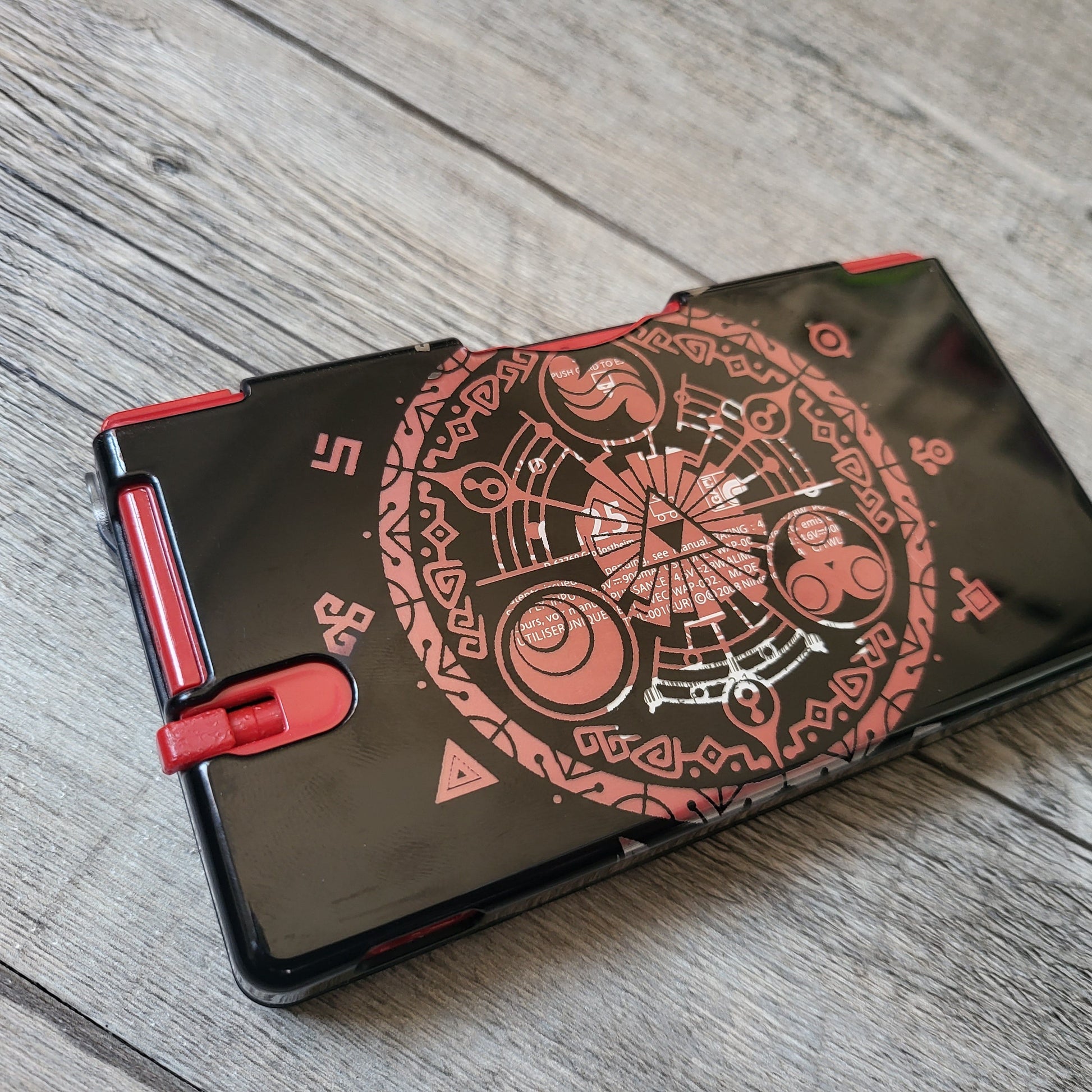 Custom shell cover for Nintendo with Zelda themed laser engravings