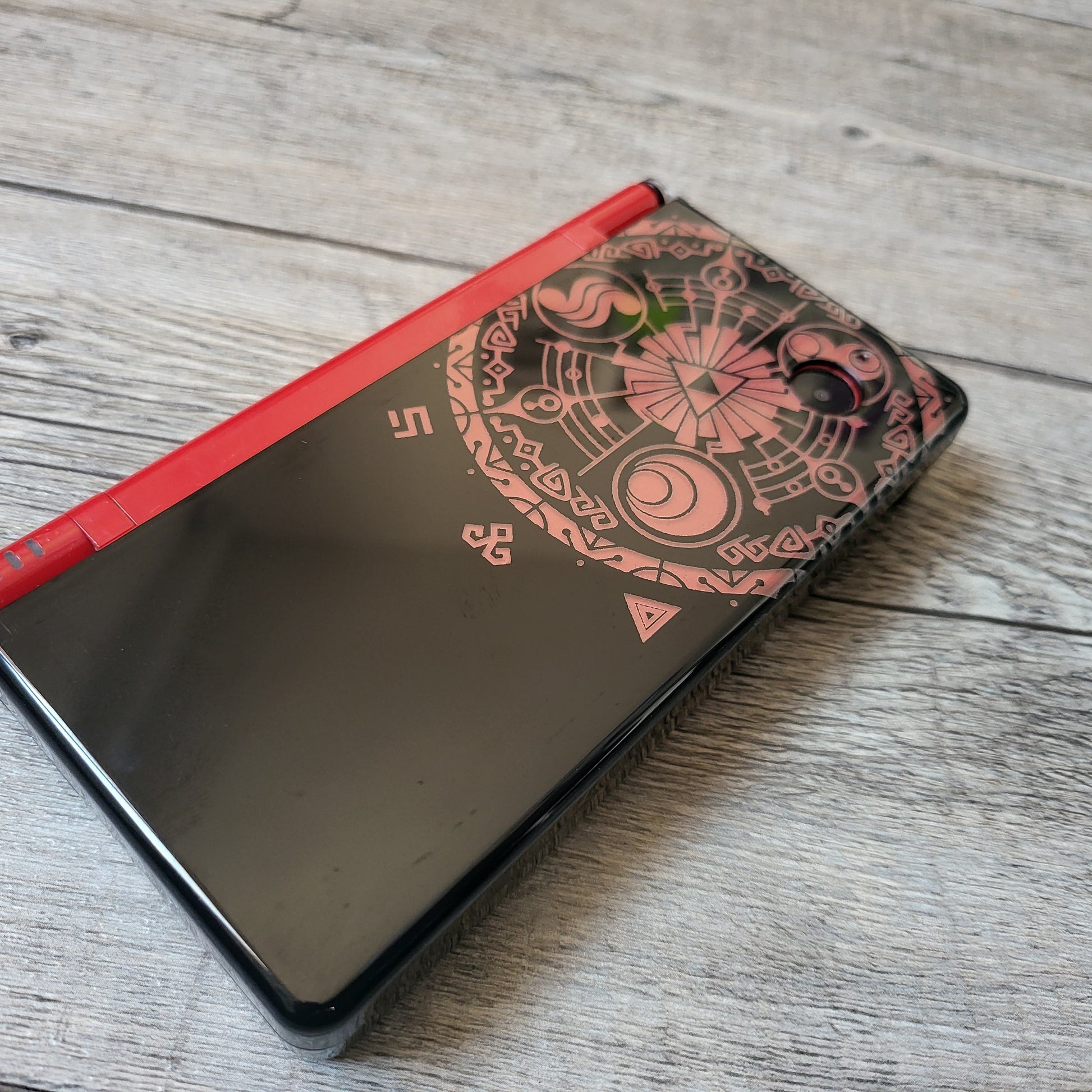 Custom shell cover for Nintendo with Zelda themed laser engravings