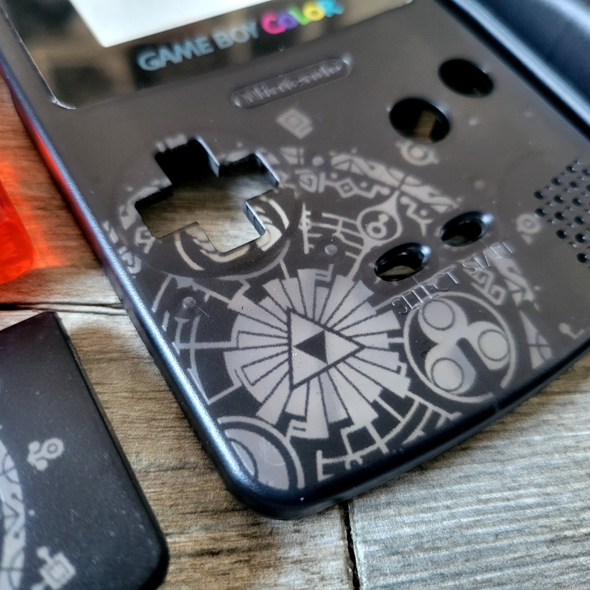 Custom shell cover for Nintendo with Zelda themed laser engravings