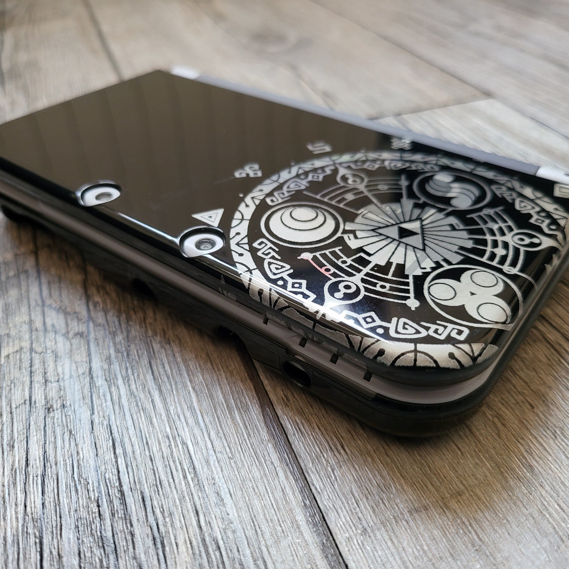 Custom shell cover for Nintendo with Zelda themed laser engravings