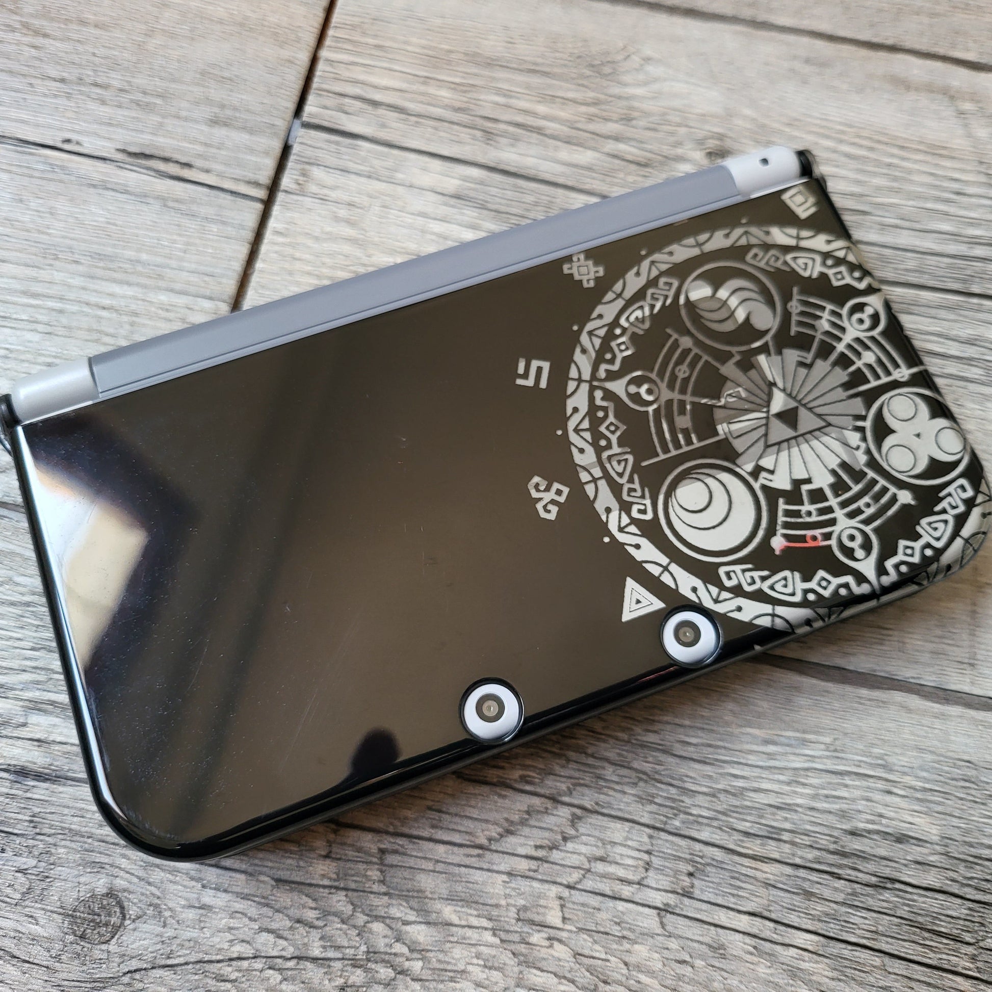 Custom shell cover for Nintendo with Zelda themed laser engravings