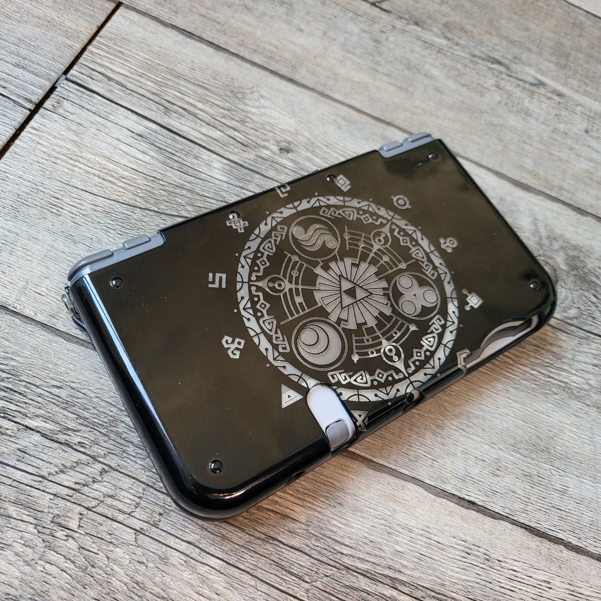 Custom shell cover for Nintendo with Zelda themed laser engravings