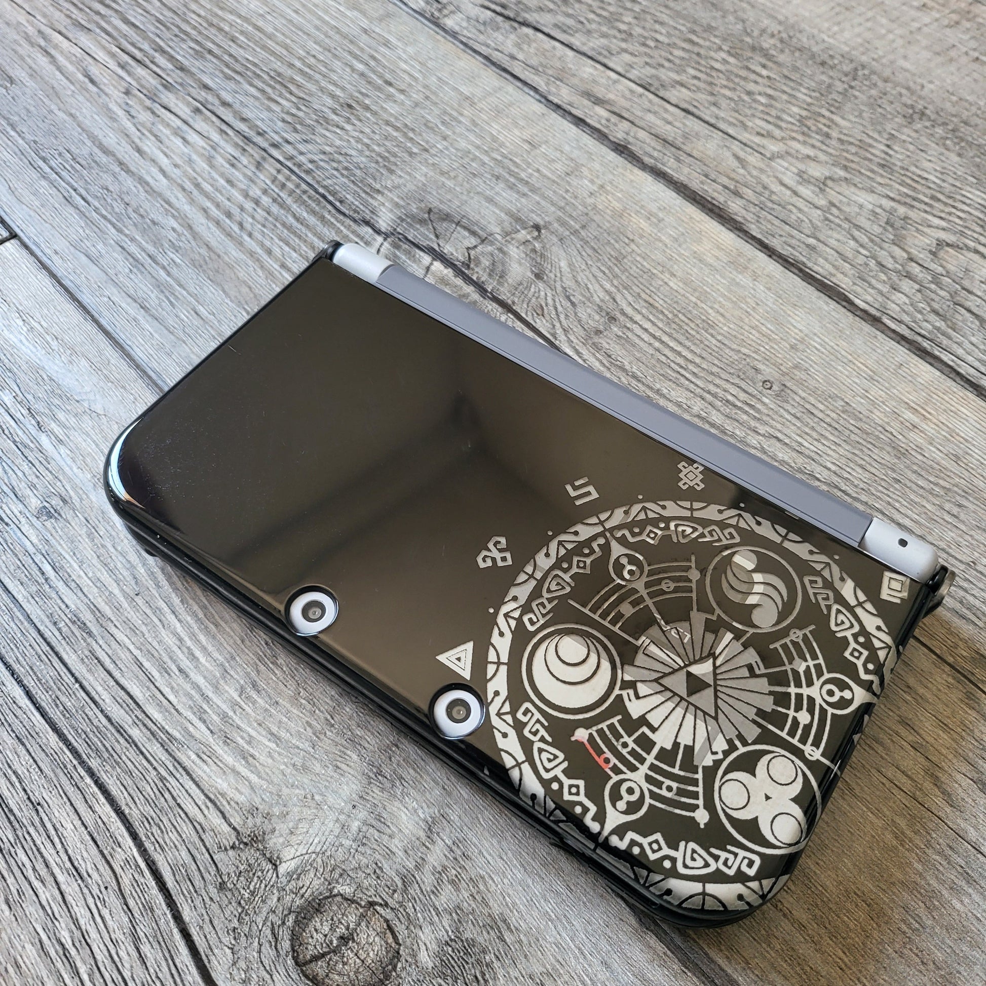 Custom shell cover for Nintendo with Zelda themed laser engravings