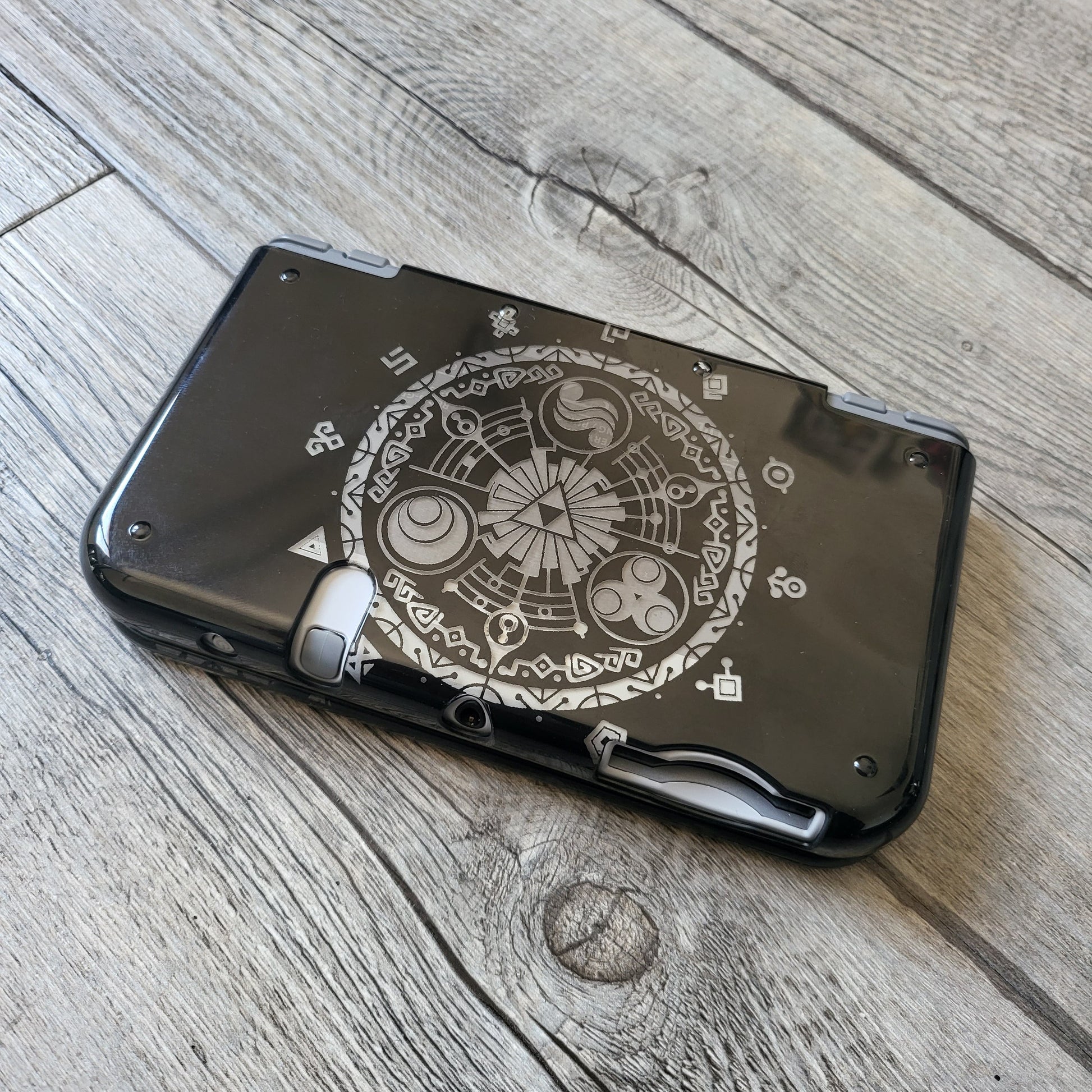 Custom shell cover for Nintendo with Zelda themed laser engravings
