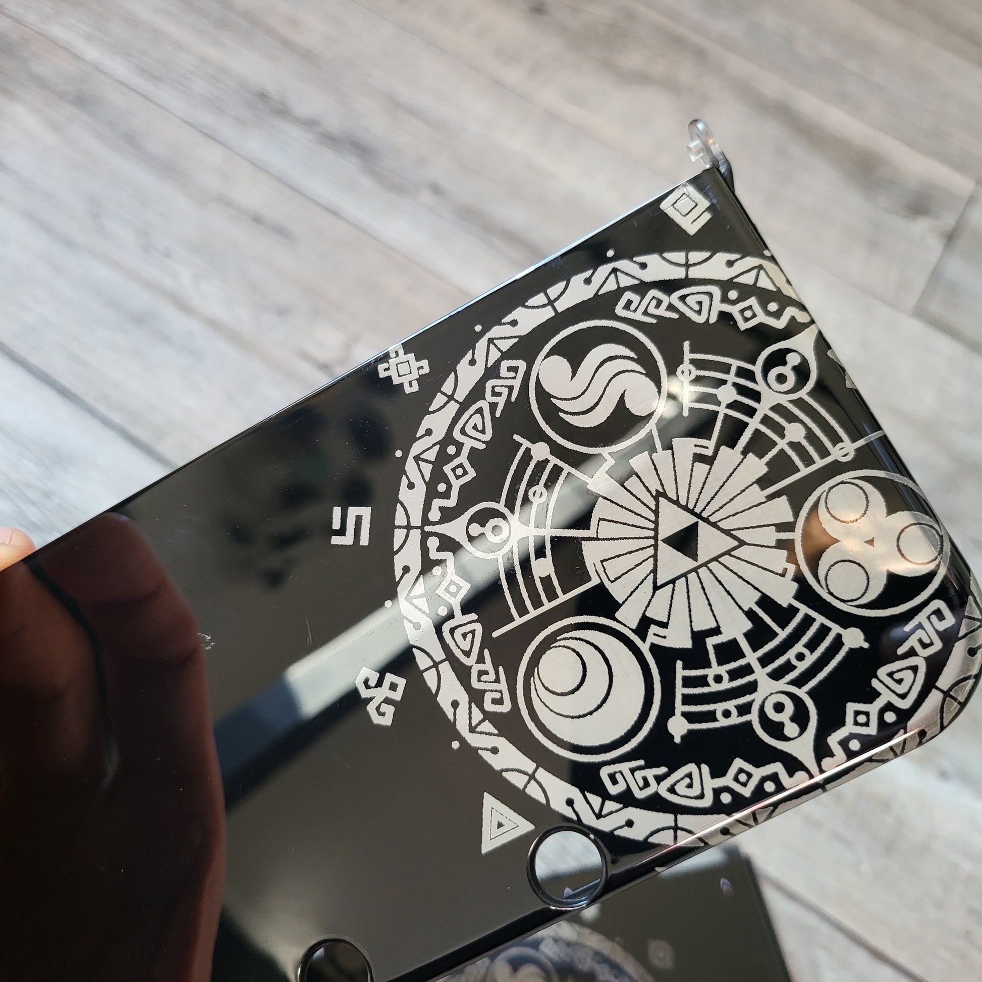 Custom shell cover for Nintendo with Zelda themed laser engravings