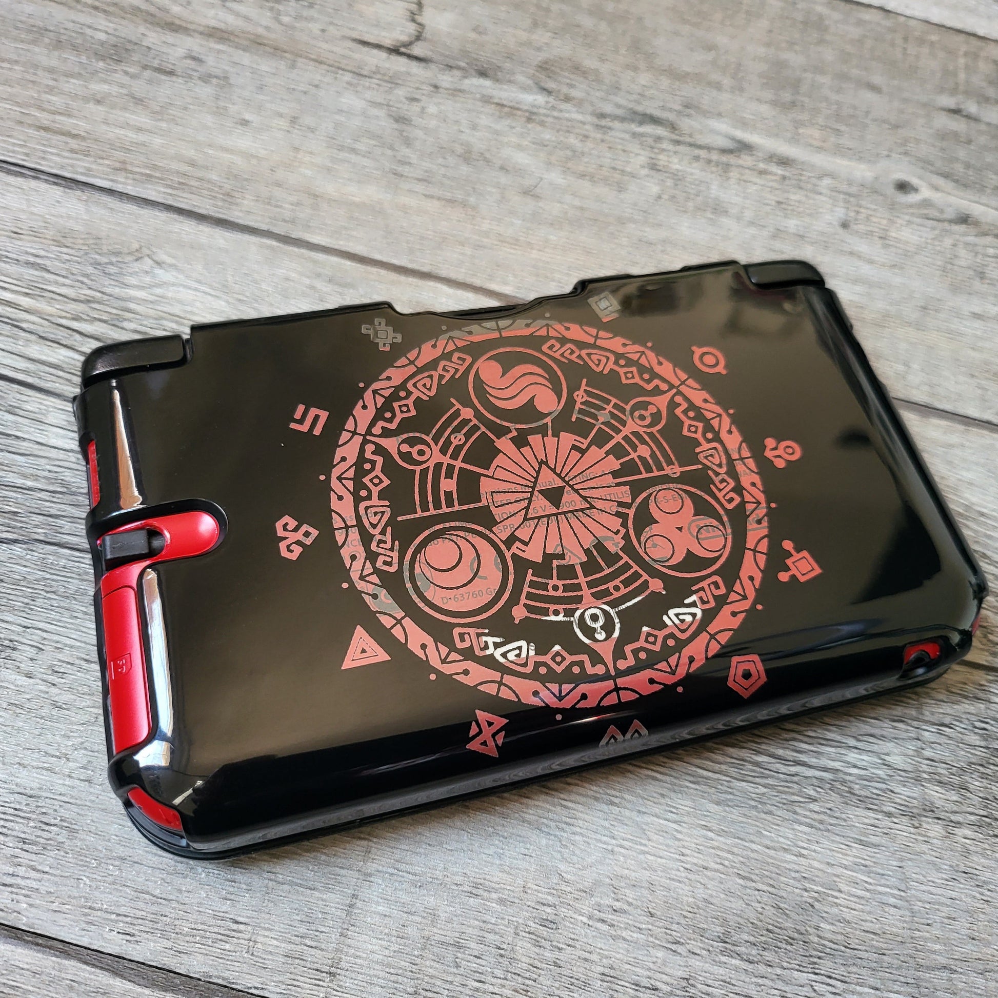 Custom shell cover for Nintendo with Zelda themed laser engravings