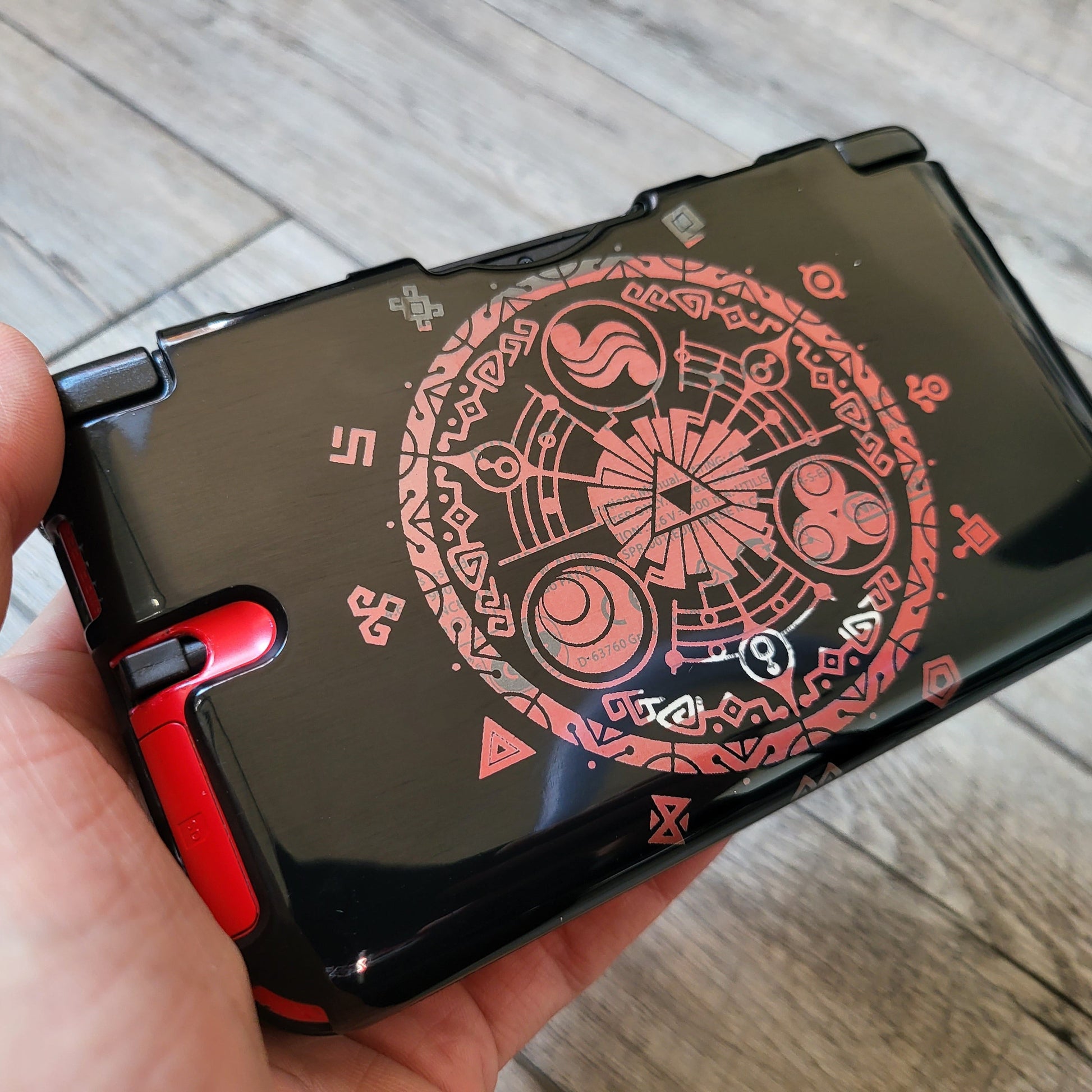 Custom shell cover for Nintendo with Zelda themed laser engravings