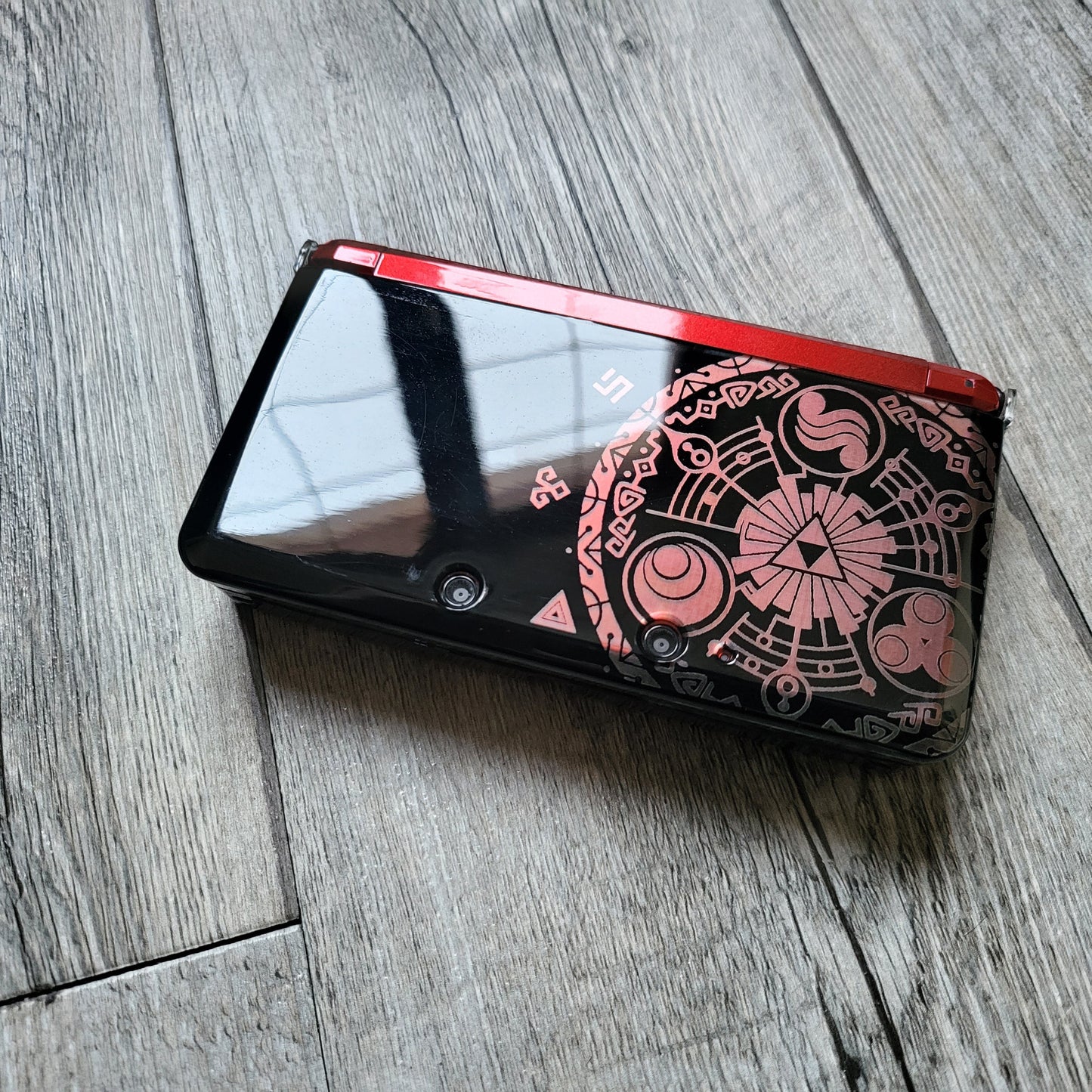 Custom shell cover for Nintendo with Zelda themed laser engravings