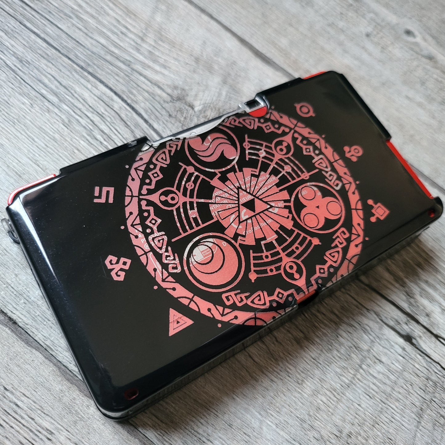 Custom shell cover for Nintendo with Zelda themed laser engravings