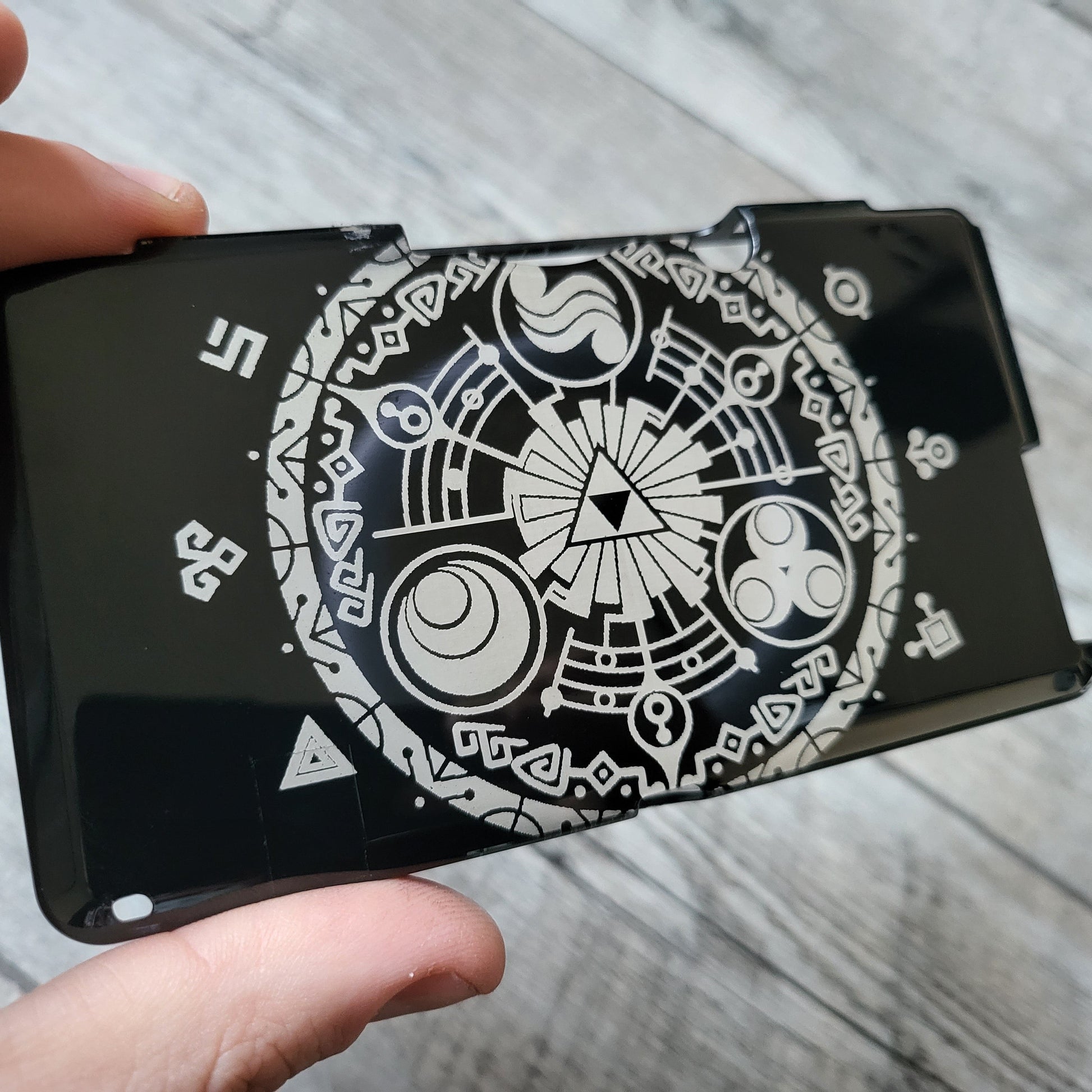Custom shell cover for Nintendo with Zelda themed laser engravings