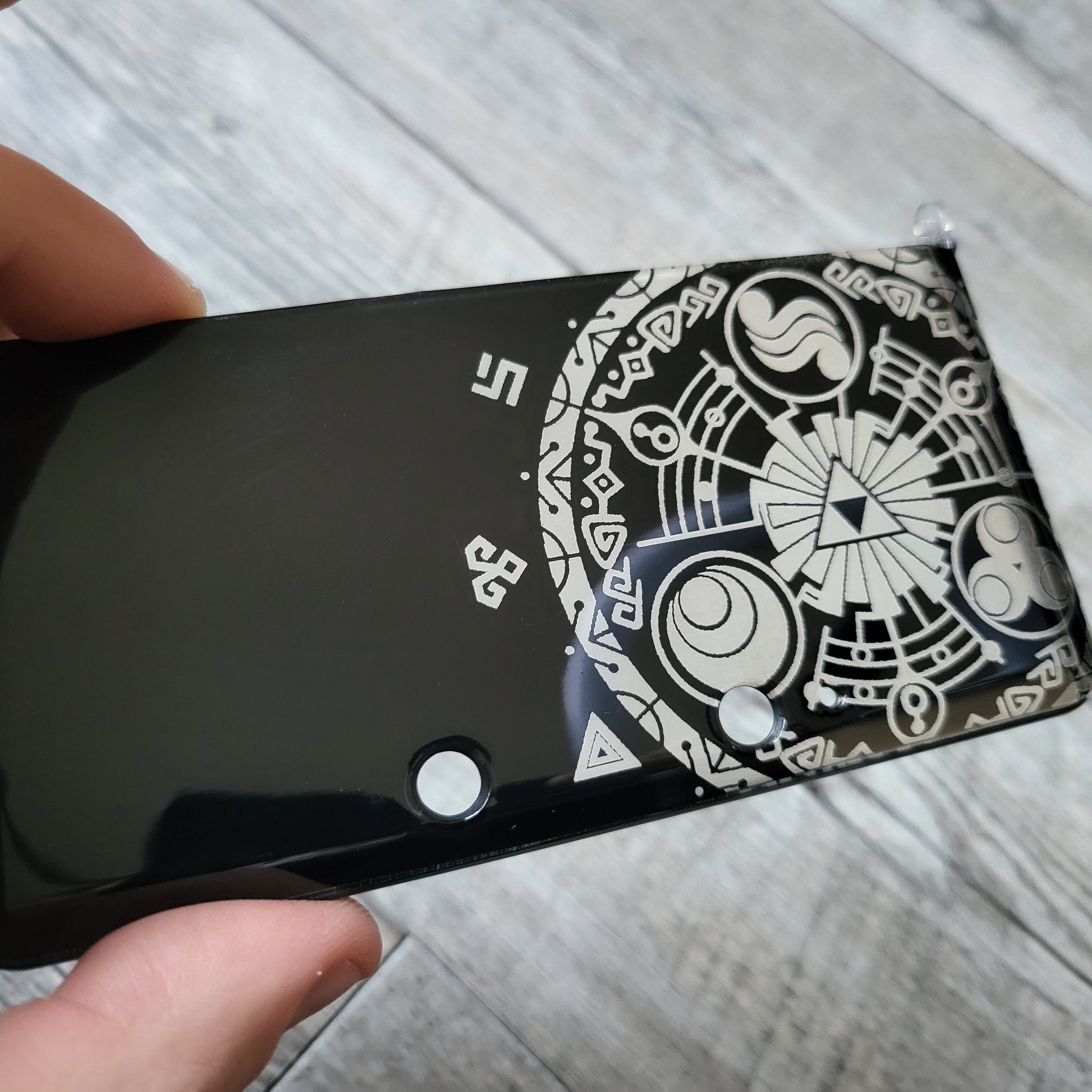 Custom shell cover for Nintendo with Zelda themed laser engravings