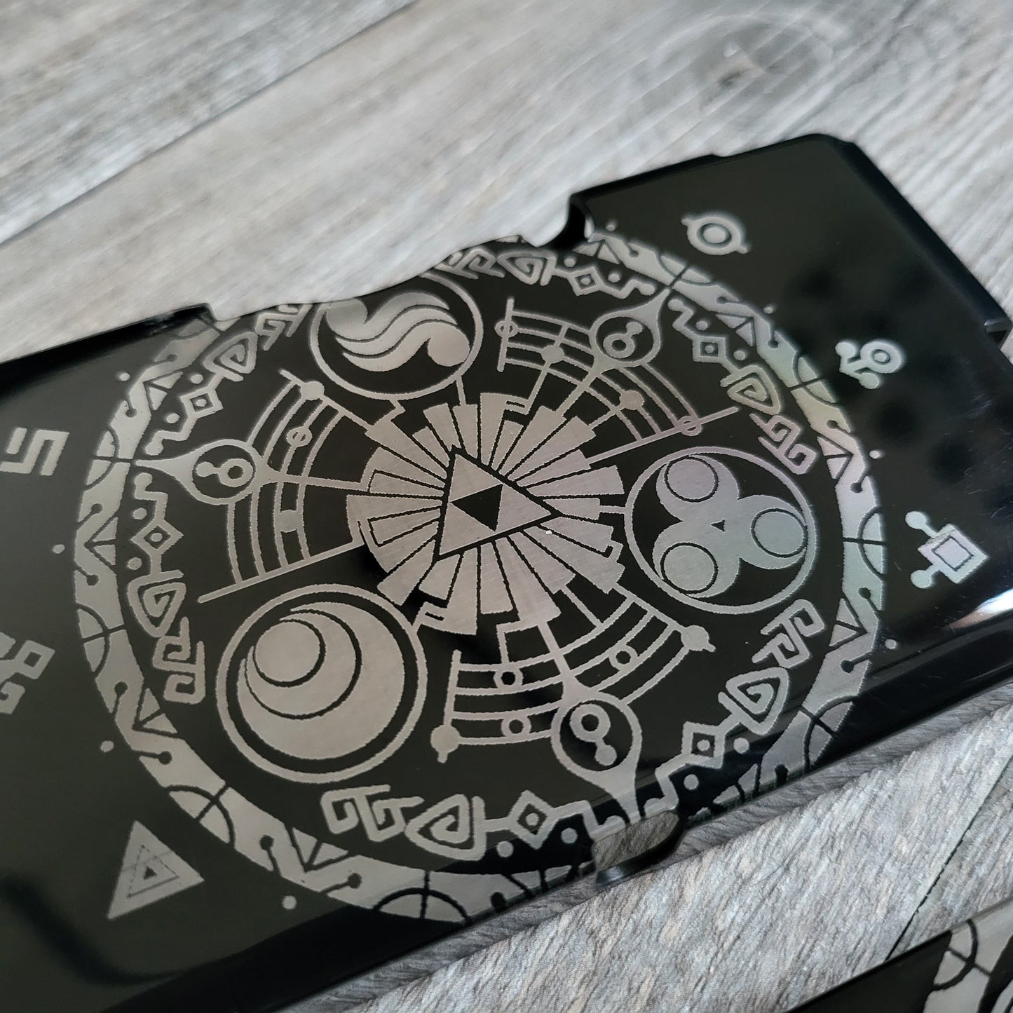 Custom shell cover for Nintendo with Zelda themed laser engravings