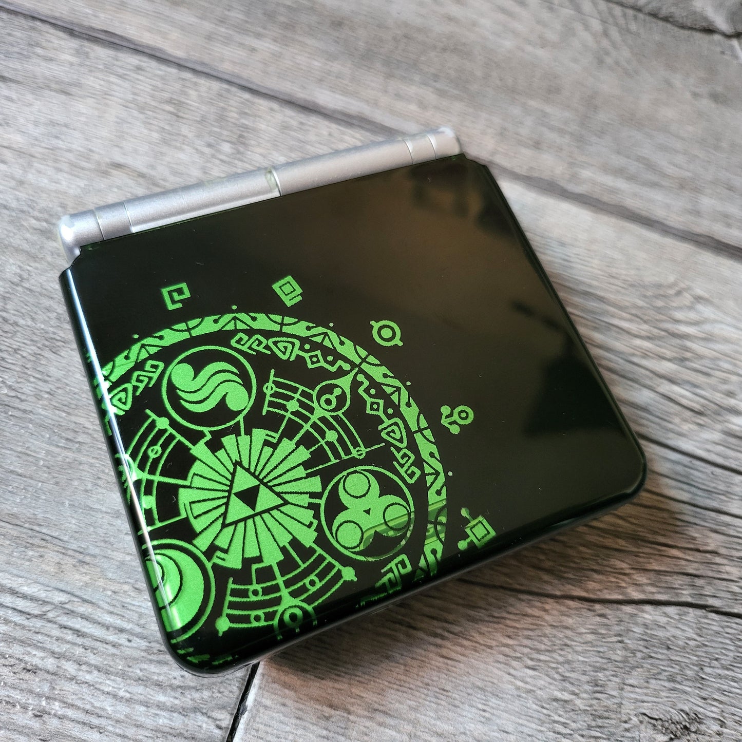 Custom shell cover for Nintendo with Zelda themed laser engravings