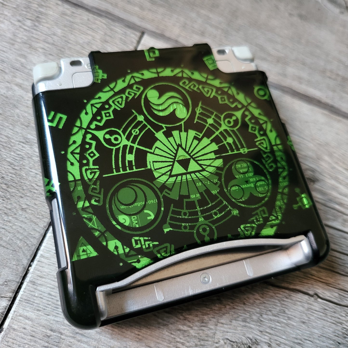 Custom shell cover for Nintendo with Zelda themed laser engravings
