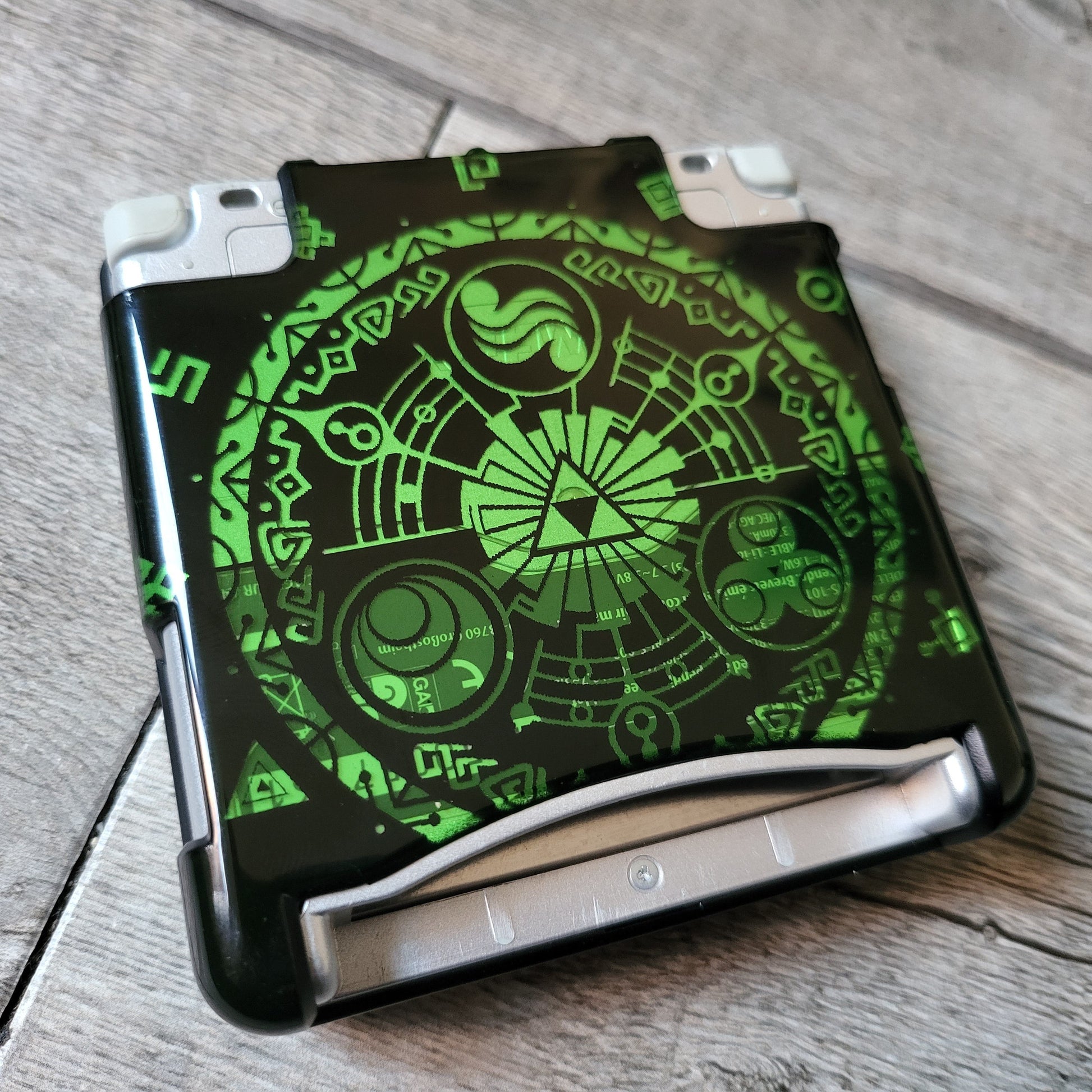 Custom shell cover for Nintendo with Zelda themed laser engravings