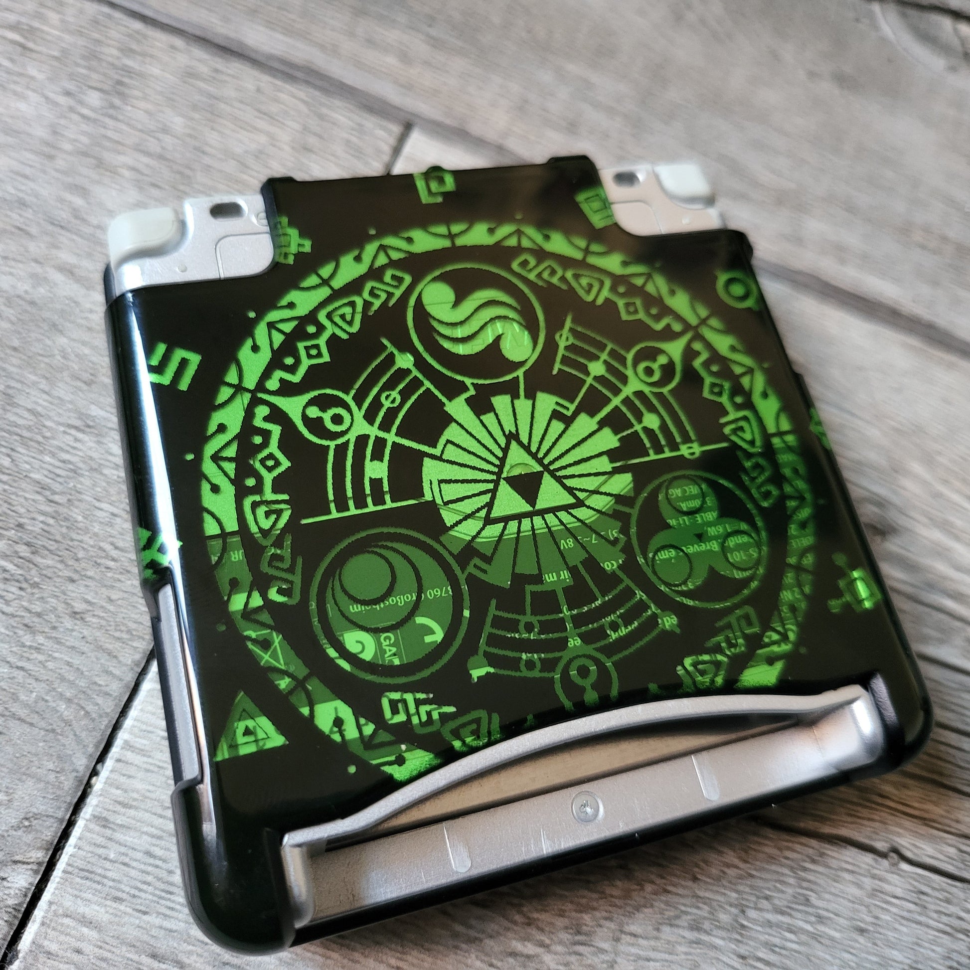 Custom shell cover for Nintendo with Zelda themed laser engravings