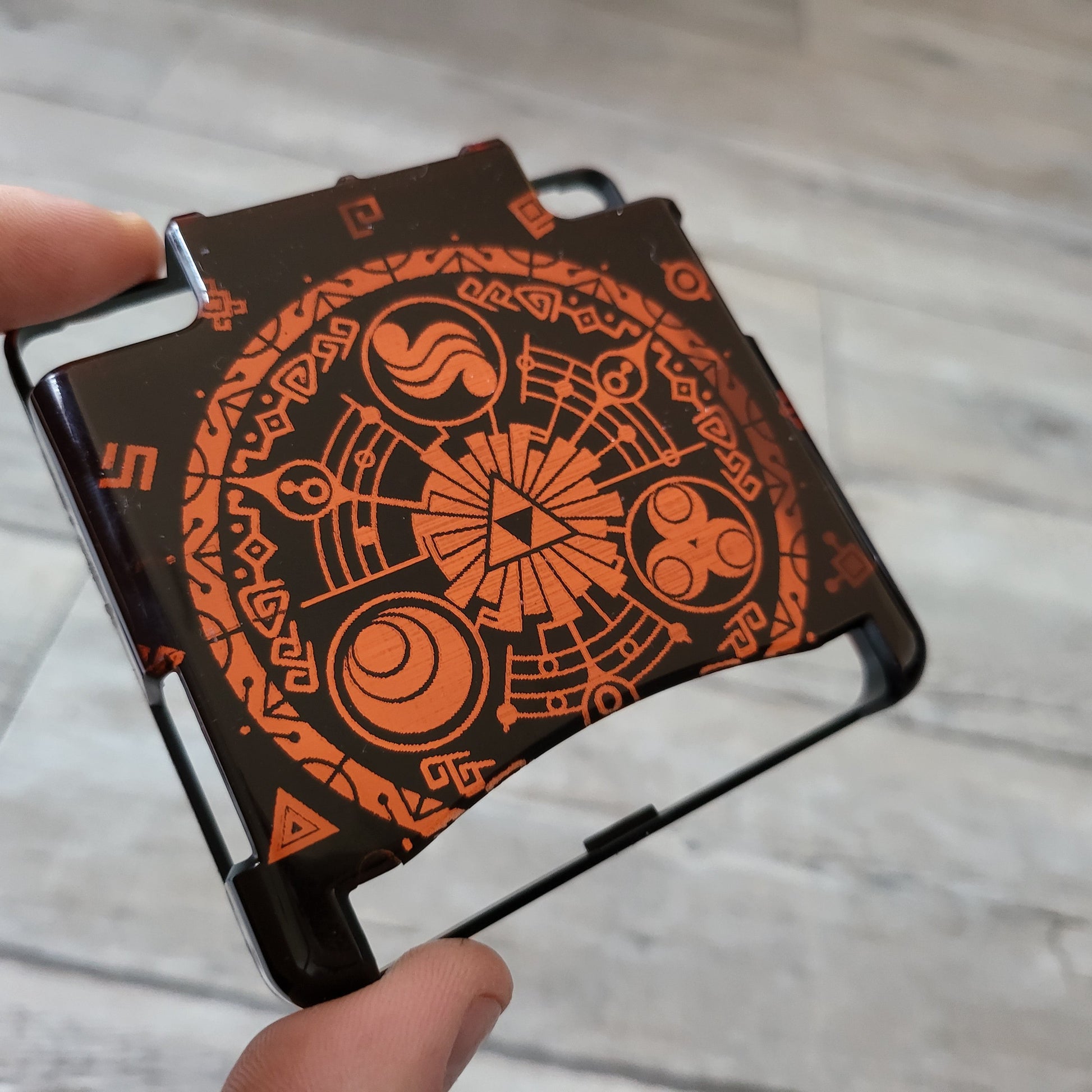 Custom shell cover for Nintendo with Zelda themed laser engravings