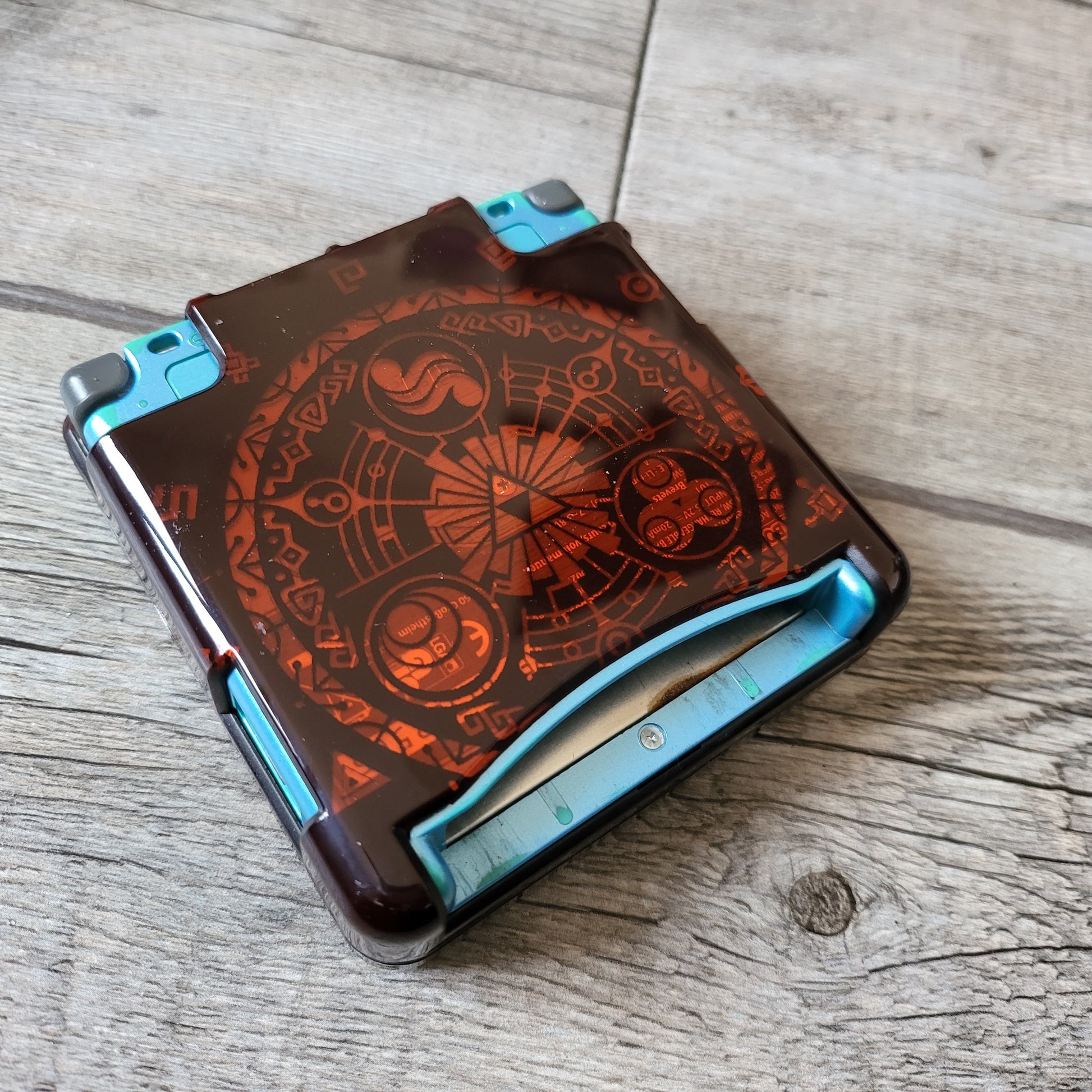 Custom shell cover for Nintendo with Zelda themed laser engravings